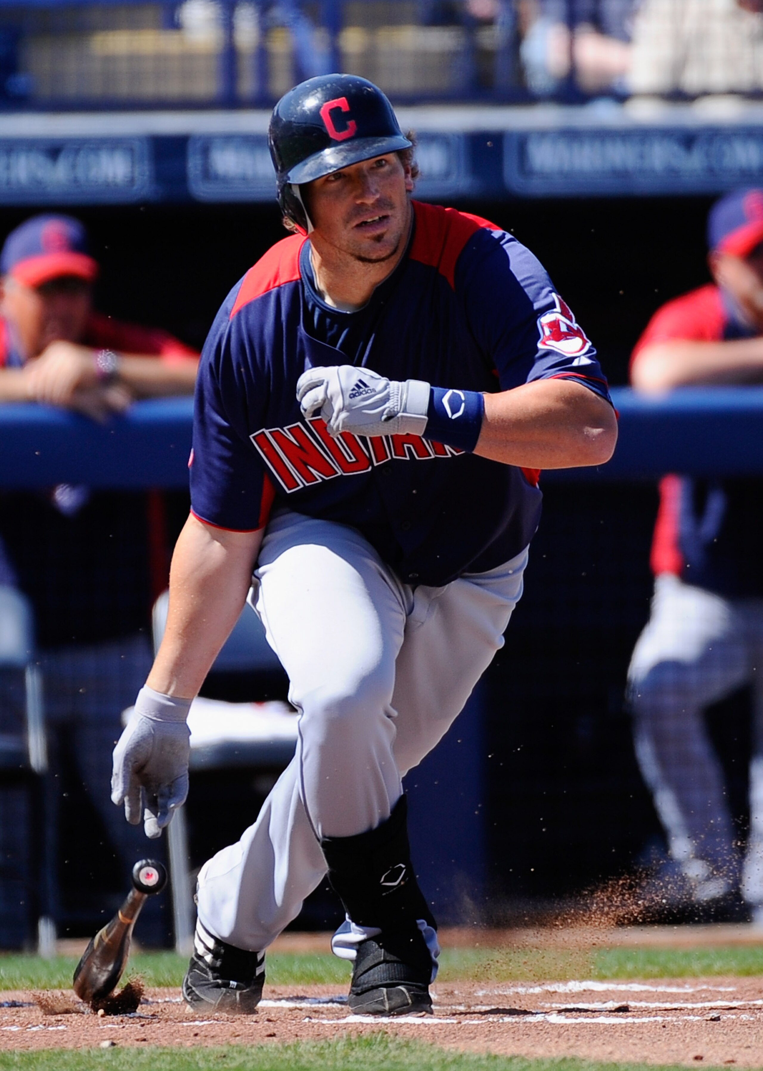 PEORIA, AZ - MARCH 13: Travis Buck #28 of the Cleveland Indians grounds out against the San Diego Padres during the first inning of the spring training baseball game at Peoria Stadium on March 13, 2011 in Peoria, Arizona.  (Photo by Kevork Djansezian/Gett