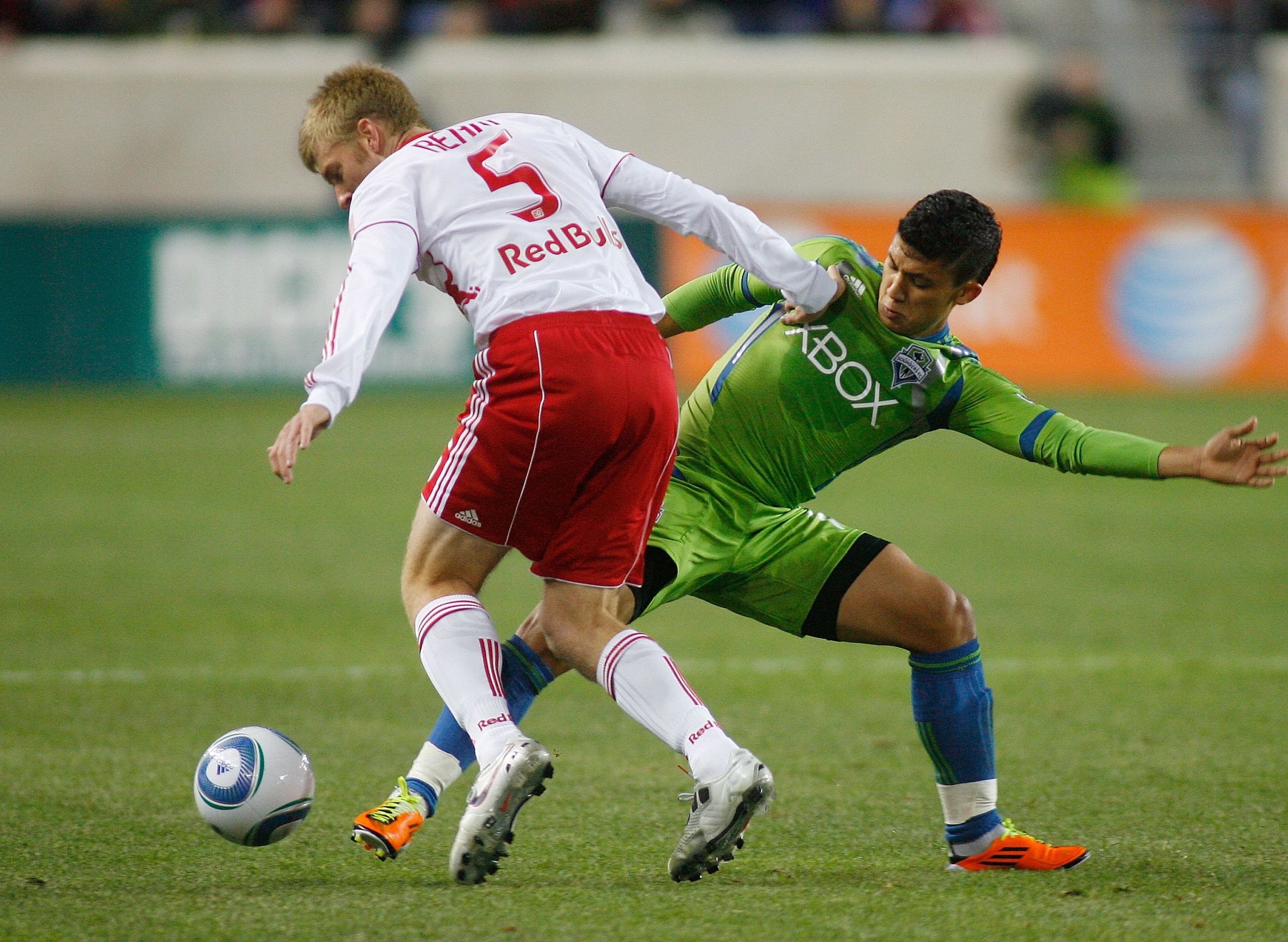 HARRISON, NJ - MARCH 19: Tim Ream #5 of the New York Red Bulls and Fredy Montero #17 of the Seattle Sounders FC battle for a loose ball during the game at Red Bull Arena on March 19, 2011 in Harrison, New Jersey. (Photo by Andy Marlin/Getty Images)