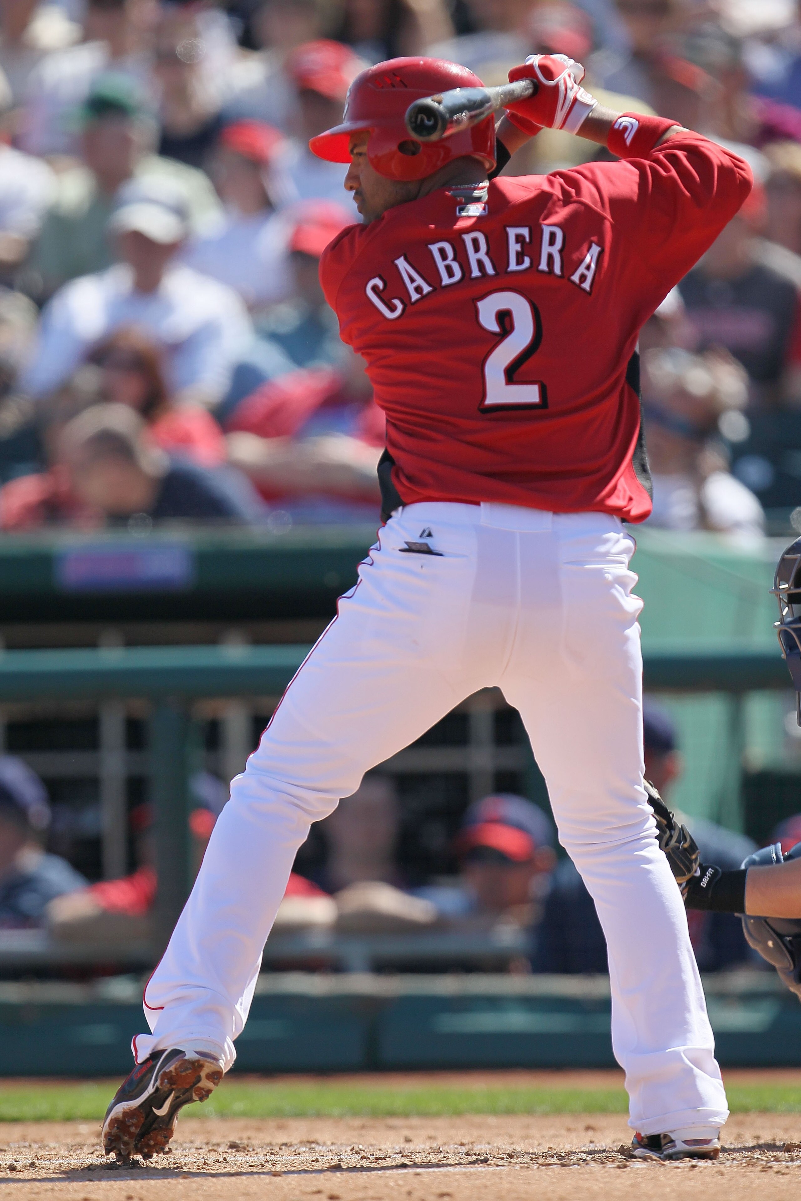 GOODYEAR, AZ - MARCH 05: Orlando Cabrera #2 of the Cincinnati Reds bats against the Cleveland Indians during a spring training game at Goodyear Ballpark on March 5, 2010 in Goodyear, Arizona.  (Photo by Chris McGrath/Getty Images)
