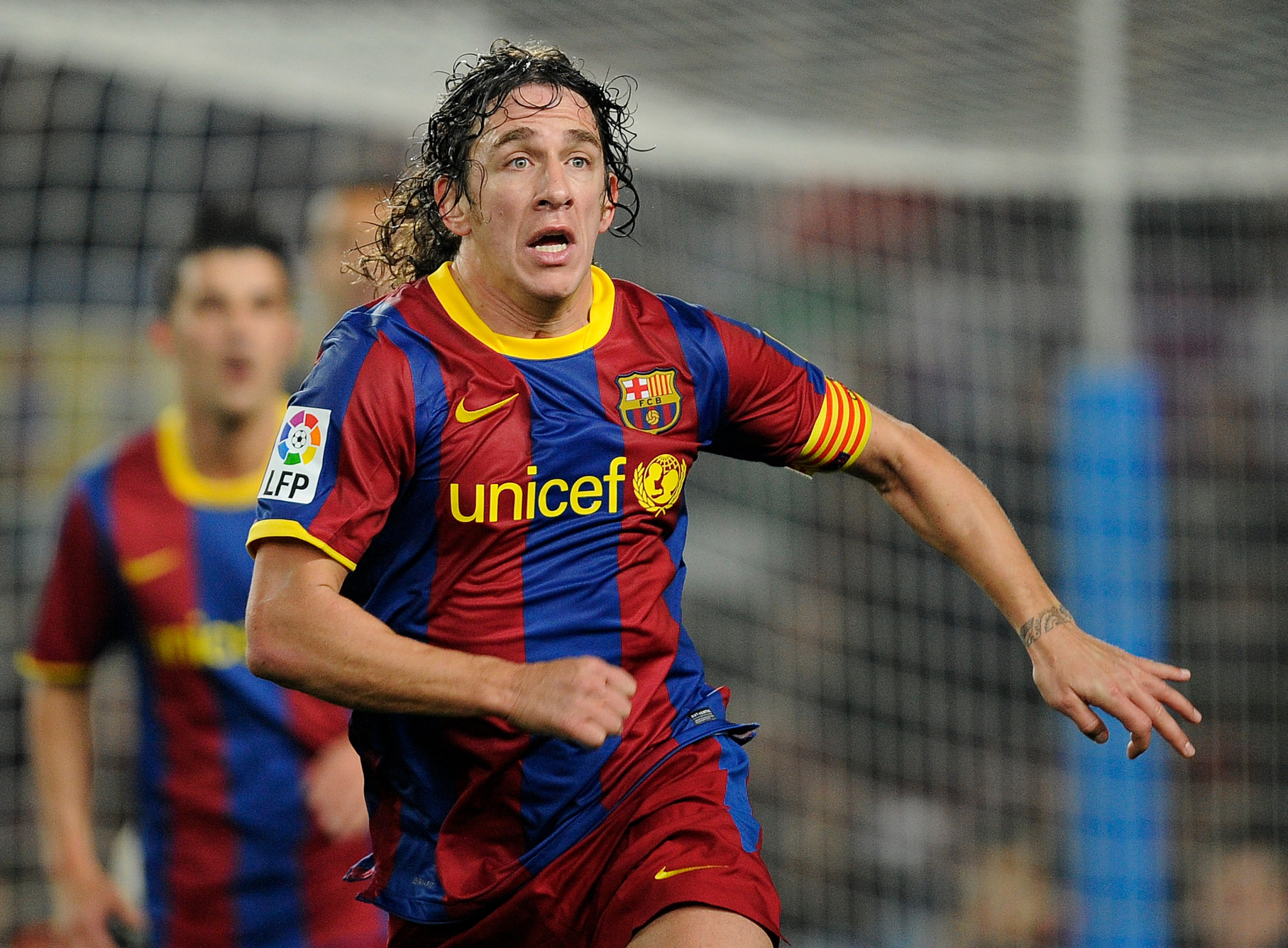 BARCELONA, SPAIN - JANUARY 16: Carles Puyol of FC Barcelona looks on during the La Liga match between FC Barcelona and Malaga at Nou Camp on January 16, 2011 in Barcelona, Spain. Barcelona won 4-1. (Photo by David Ramos/Getty Images) BARCELONA, SPAIN - JANUARY 16: Carles Puyol of FC Barcelona looks on during the La Liga match between FC Barcelona and Malaga at Nou Camp on January 16, 2011 in Barcelona, Spain. Barcelona won 4-1. (Photo by David Ramos/Getty Images)