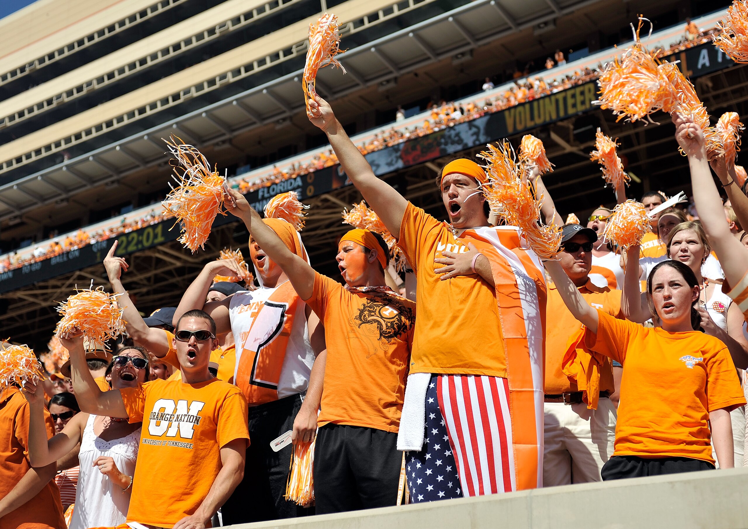 KNOXVILLE, TN - SEPTEMBER 18:  Orange-clad Tennessee Volunteers fans sing along with 'Rocky Top' during a game against the Florida Gators at Neyland Stadium on September 18, 2010 in Knoxville, Tennessee. Florida won 31-17.  (Photo by Grant Halverson/Getty