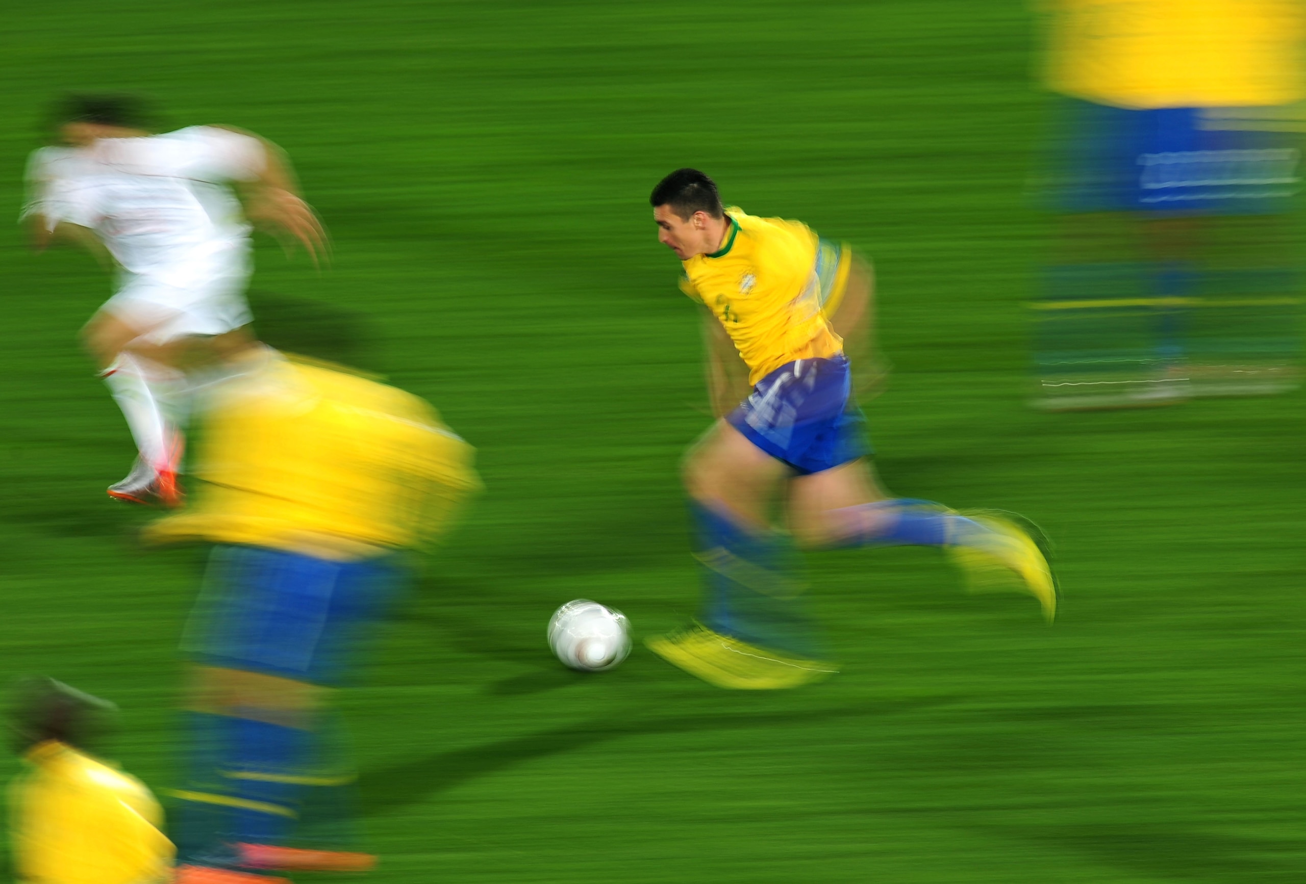 JOHANNESBURG, SOUTH AFRICA - JUNE 28:  Lucio of Brazil runs with the ball during the 2010 FIFA World Cup South Africa Round of Sixteen match between Brazil and Chile at Ellis Park Stadium on June 28, 2010 in Johannesburg, South Africa.  (Photo by Clive Ma
