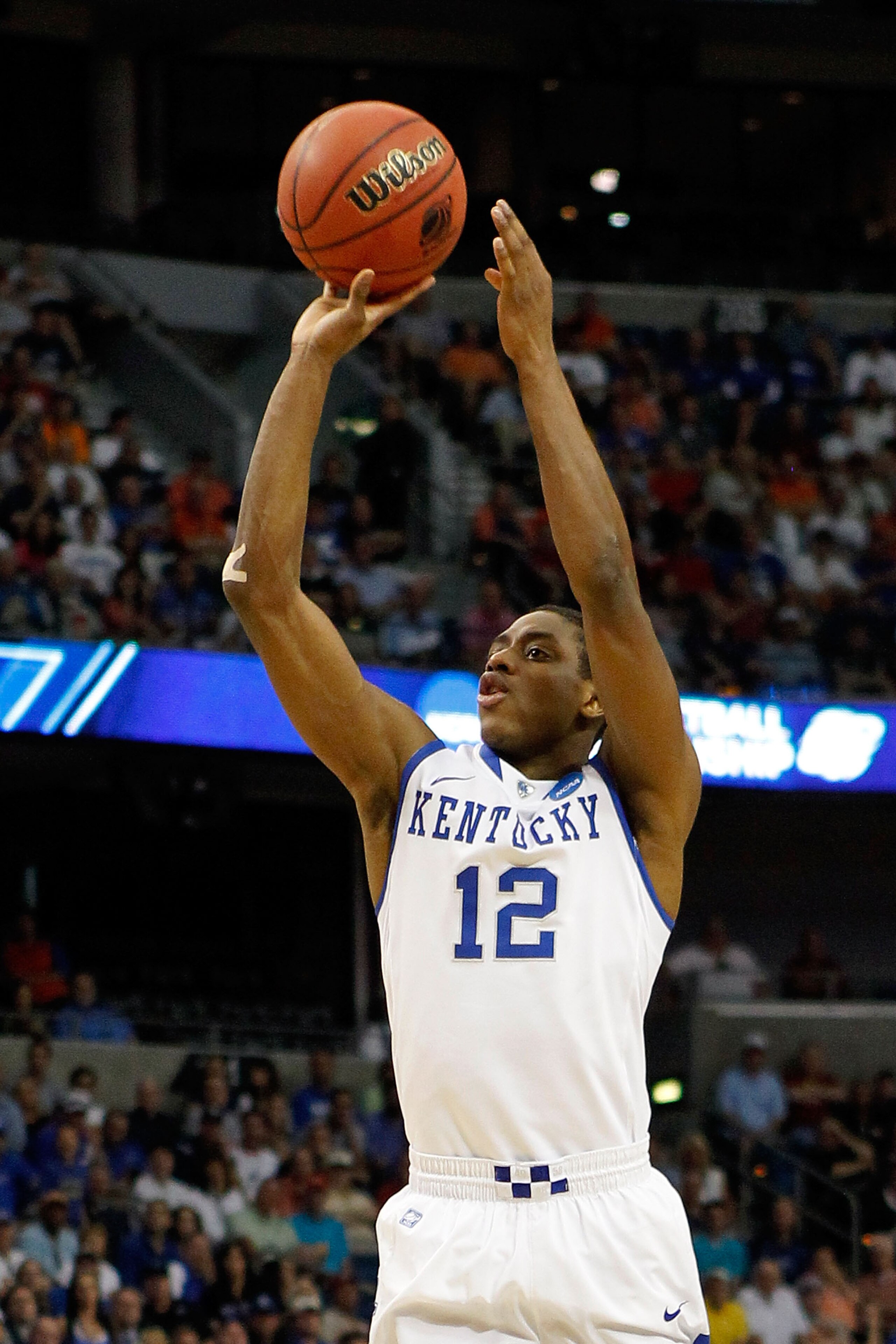 TAMPA, FL - MARCH 19:  Brandon Knight #12 of the Kentucky Wildcats attempts a shot against the West Virginia Mountaineers during the third round of the 2011 NCAA men's basketball tournament at St. Pete Times Forum on March 19, 2011 in Tampa, Florida. Kent