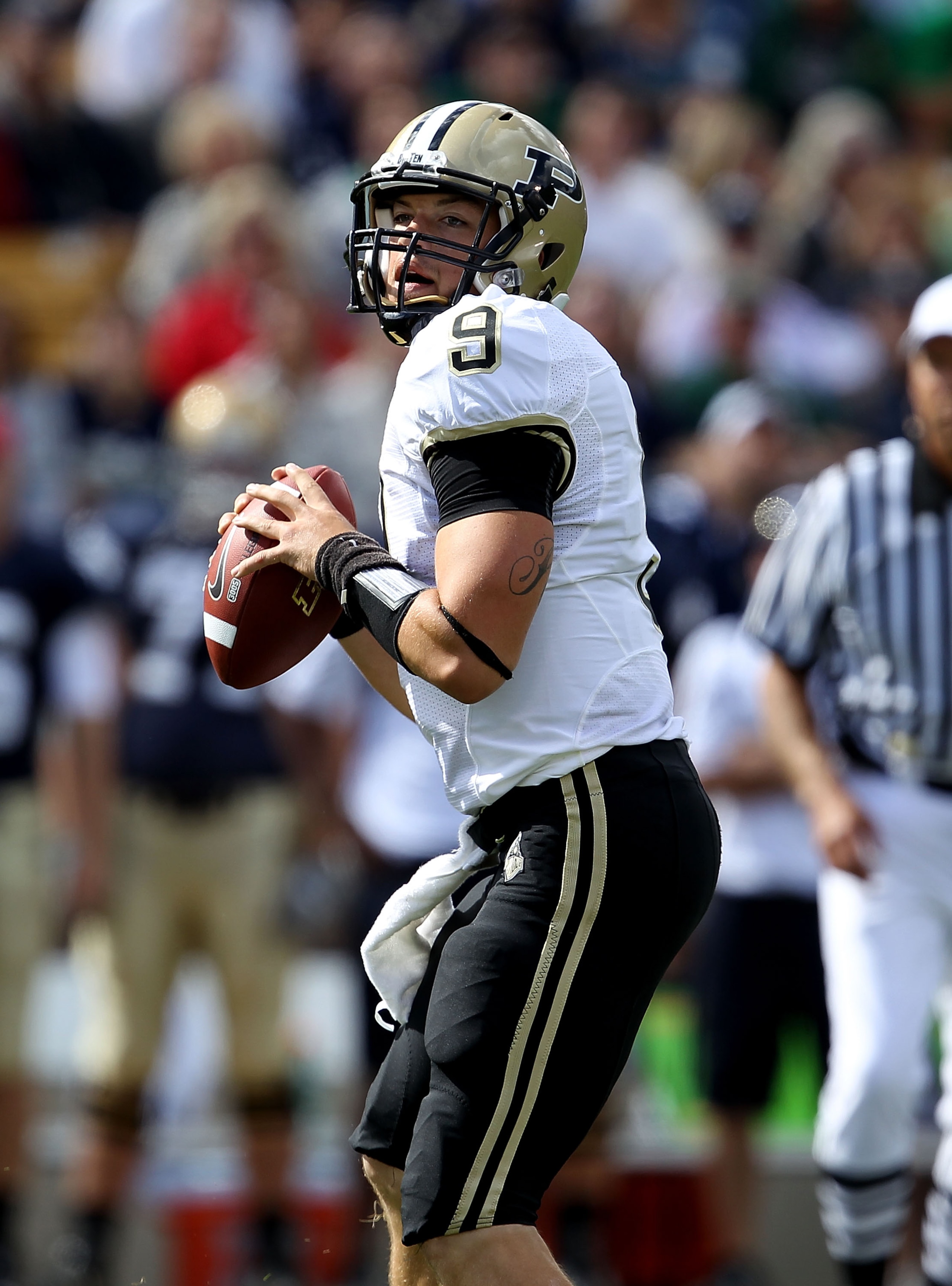 SOUTH BEND, IN - SEPTEMBER 04: Robert Marve #9 of the Purdue Boilermakers looks for a receiver against the Notre Dame Fighting Irish at Notre Dame Stadium on September 4, 2010 in South Bend, Indiana. Notre Dame defated Purdue 23-12. (Photo by Jonathan Dan SOUTH BEND, IN - SEPTEMBER 04: Robert Marve #9 of the Purdue Boilermakers looks for a receiver against the Notre Dame Fighting Irish at Notre Dame Stadium on September 4, 2010 in South Bend, Indiana. Notre Dame defated Purdue 23-12. (Photo by Jonathan Dan