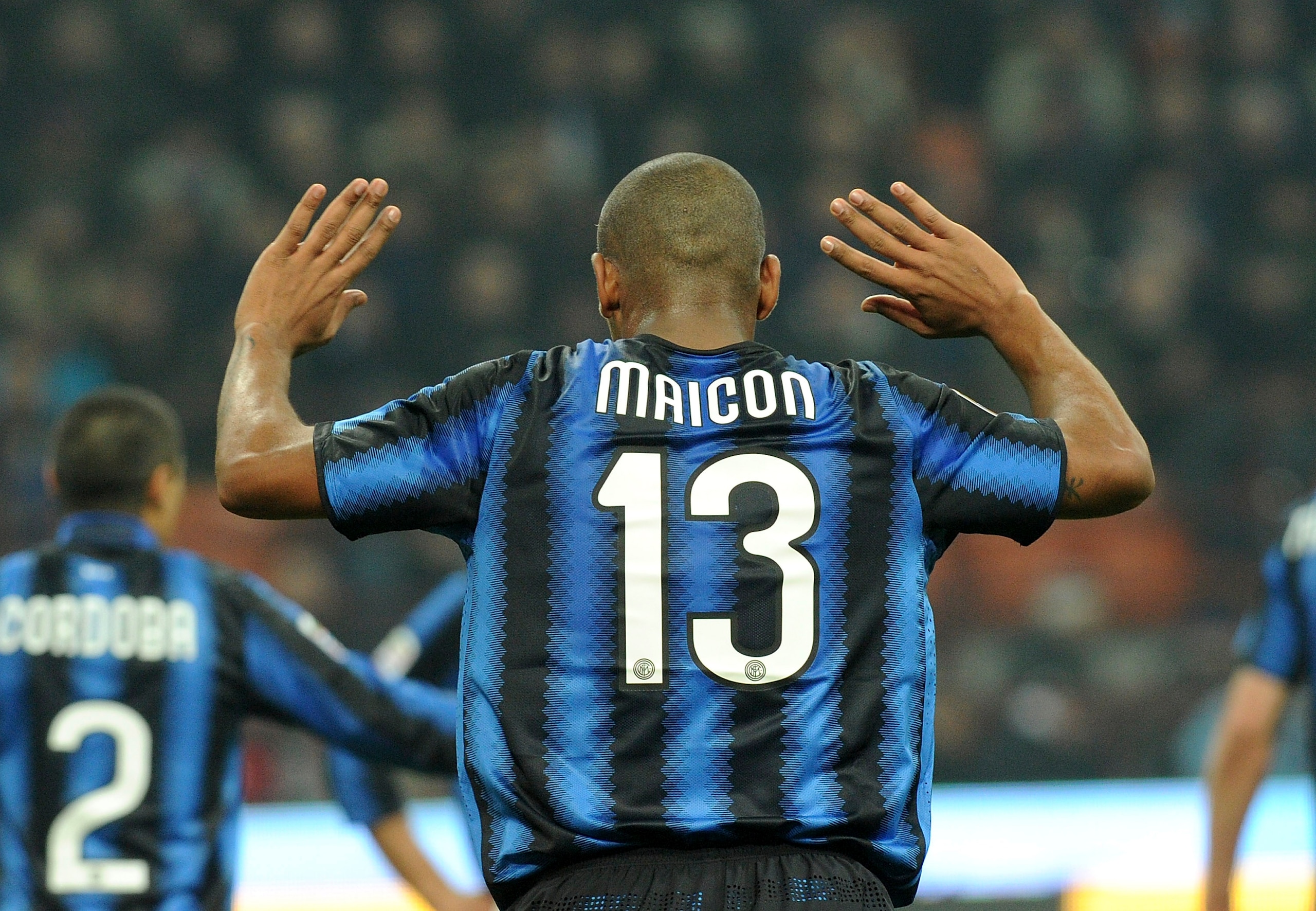 MILAN, ITALY - FEBRUARY 06:  Maicon of Inter reacts during the Serie A match between FC Internazionale Milano and AS Roma at Stadio Giuseppe Meazza on February 6, 2011 in Milan, Italy.  (Photo by Dino Panato/Getty Images)