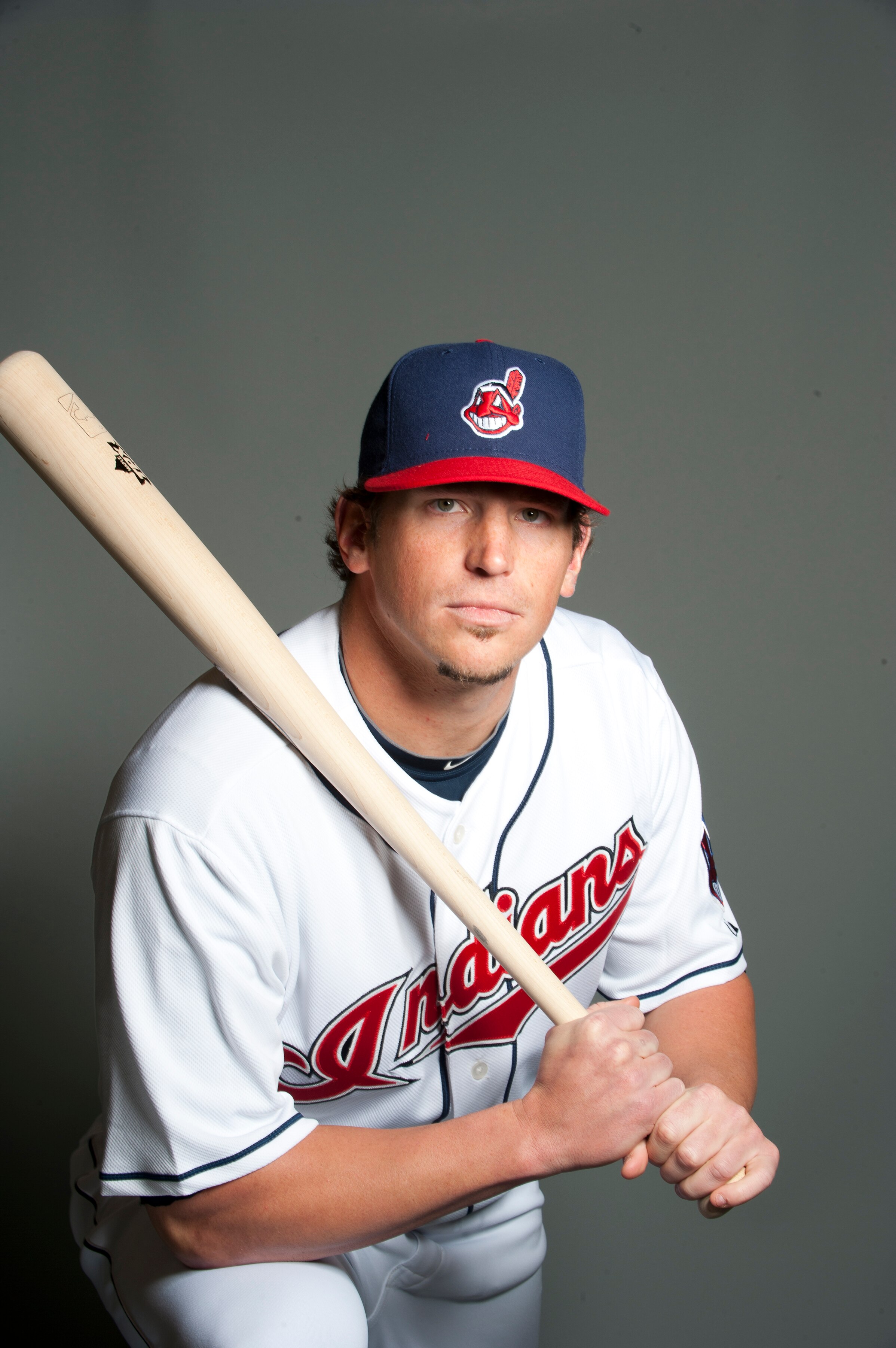 GOODYEAR, AZ - FEBRUARY 22: Travis Buck #28 of the Cleveland Indians poses during their photo day at the Cleveland Indians Spring Training Complex on February 22, 2011 in Goodyear, Arizona. (Photo by Rob Tringali/Getty Images)