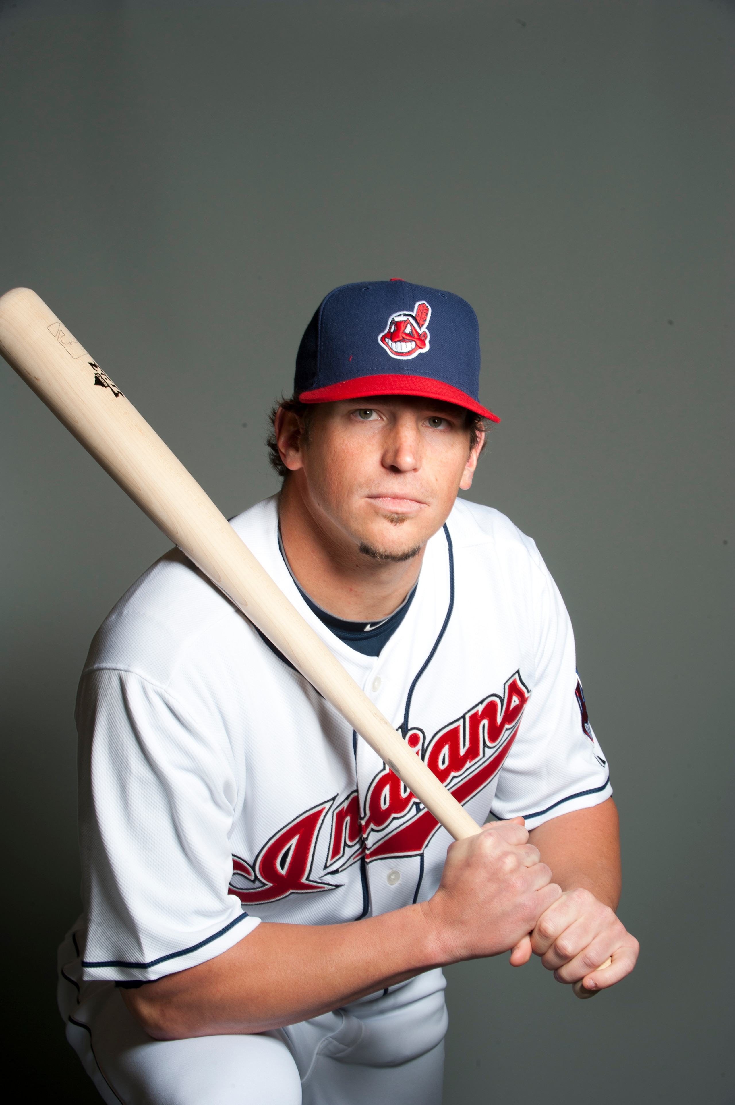GOODYEAR, AZ - FEBRUARY 22: Travis Buck #28 of the Cleveland Indians poses during their photo day at the Cleveland Indians Spring Training Complex on February 22, 2011 in Goodyear, Arizona. (Photo by Rob Tringali/Getty Images)