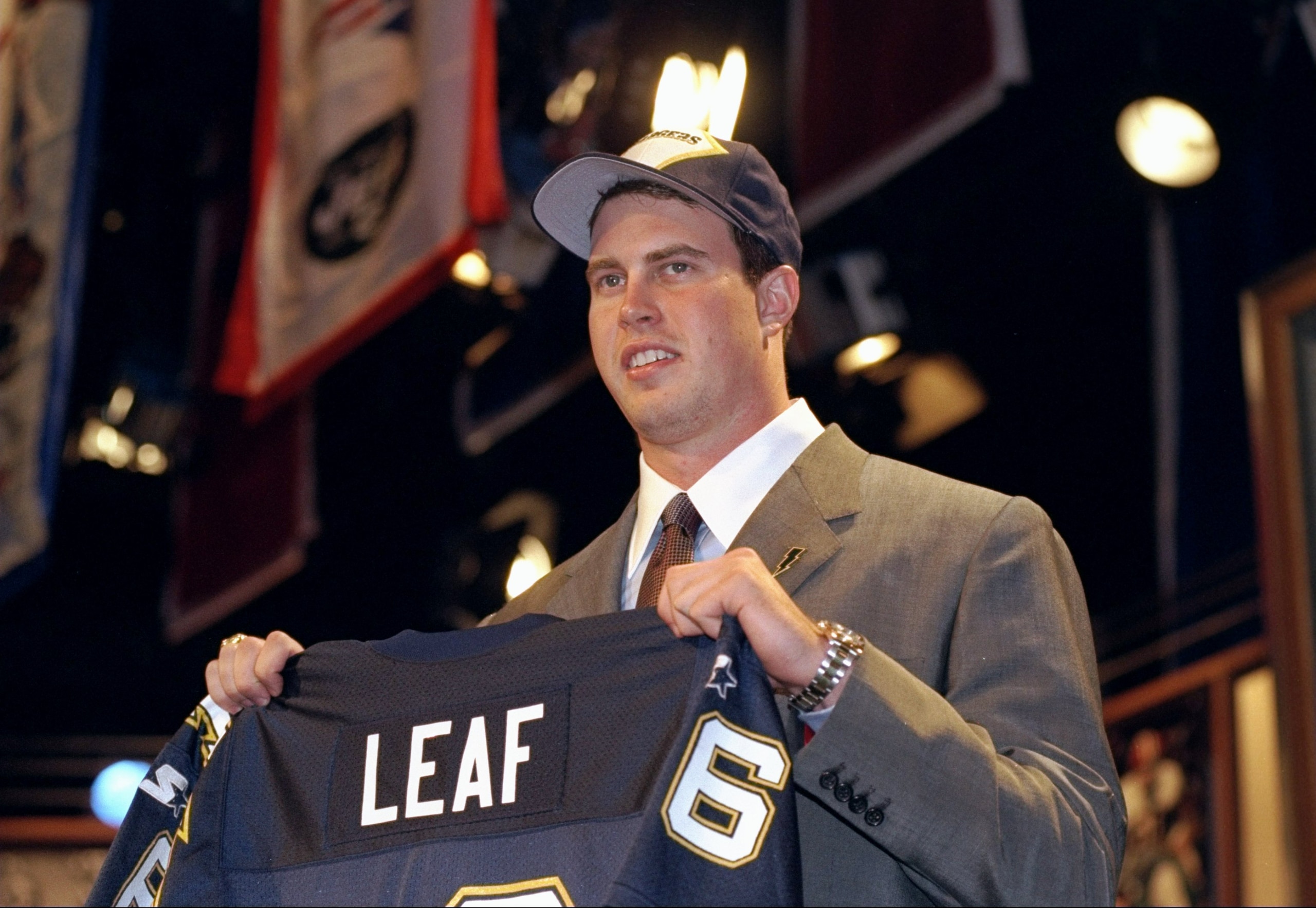 18 Apr 1998:  Second overall pick Ryan Leaf shows off his jersey after being selected by the San Diego Chargers in the first round of the 1998 NFL Draft at Madison Square Garden in Manhattan, New York. Mandatory Credit: Ezra C. Shaw  /Allsport