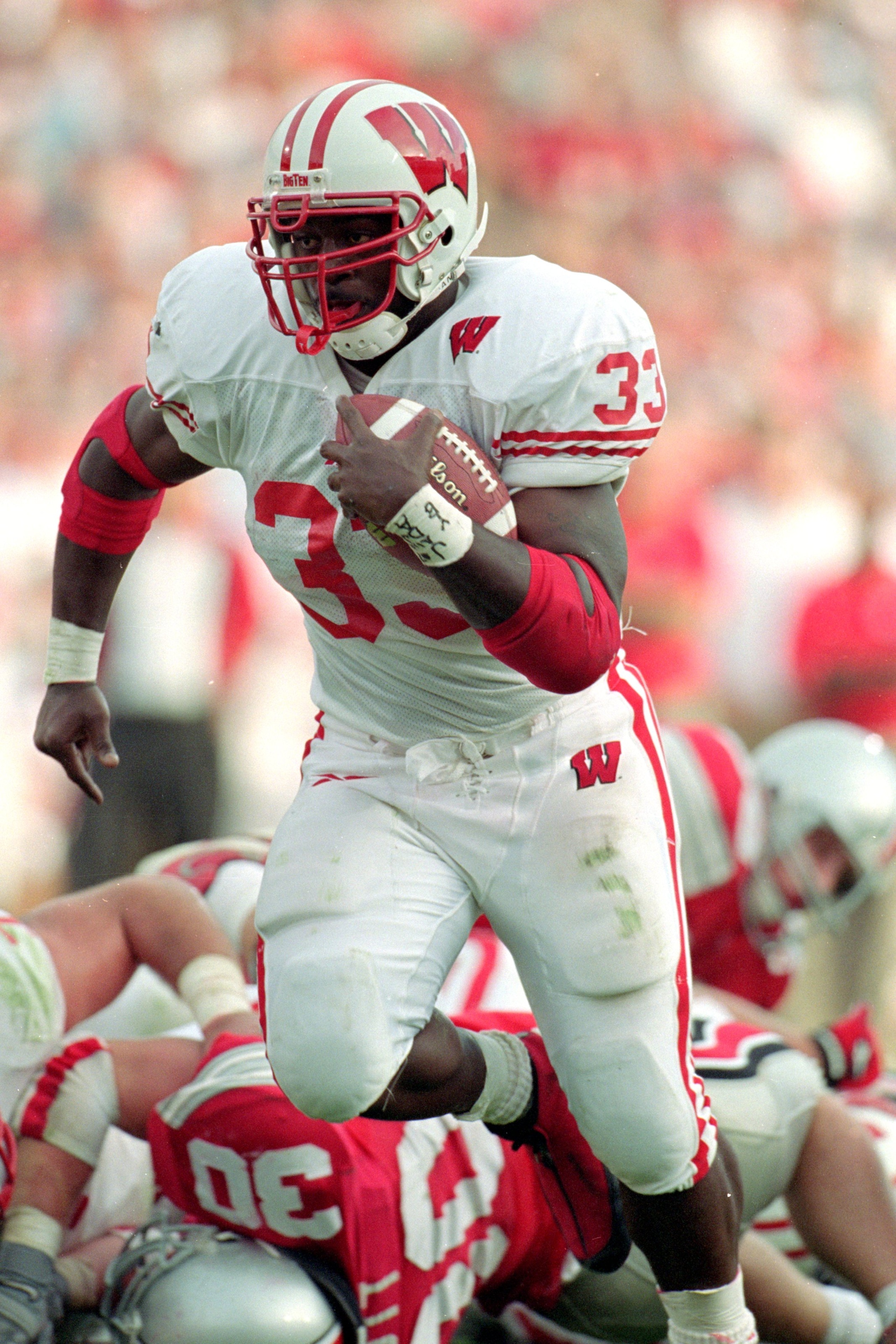 2 Oct 1999: Ron Dayne #33 of the Wisconsin Badgers carries the ball during the game against the Ohio State Buckeyes at the Ohio Stadium in Columbus, Ohio. The Badgers defeated the Buckeyes 42-17. Mandatory Credit: Tom Hauck  /Allsport