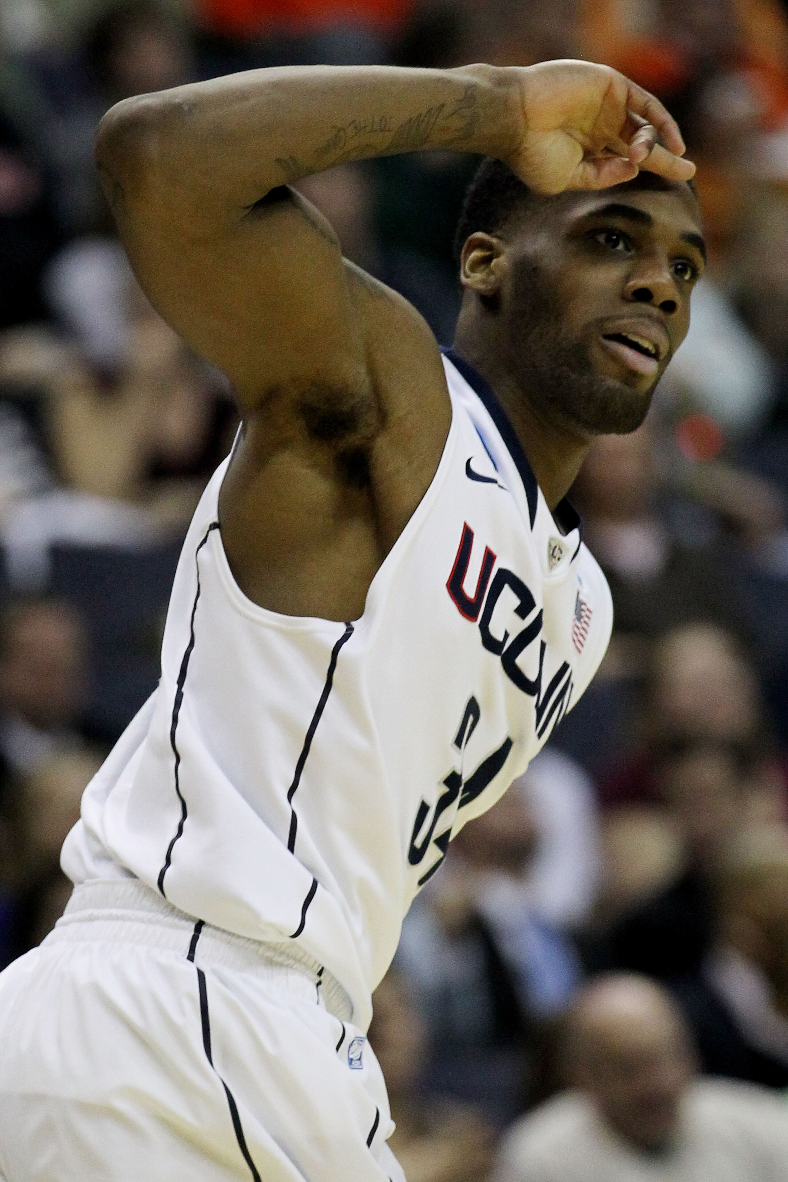 WASHINGTON - MARCH 17:  Alex Oriakhi #34 of the Connecticut Huskies celebrates against the Bucknell Bison during the second round of the 2011 NCAA men's basketball tournament at the Verizon Center on March 17, 2011 in Washington, DC.  (Photo by Nick Laham