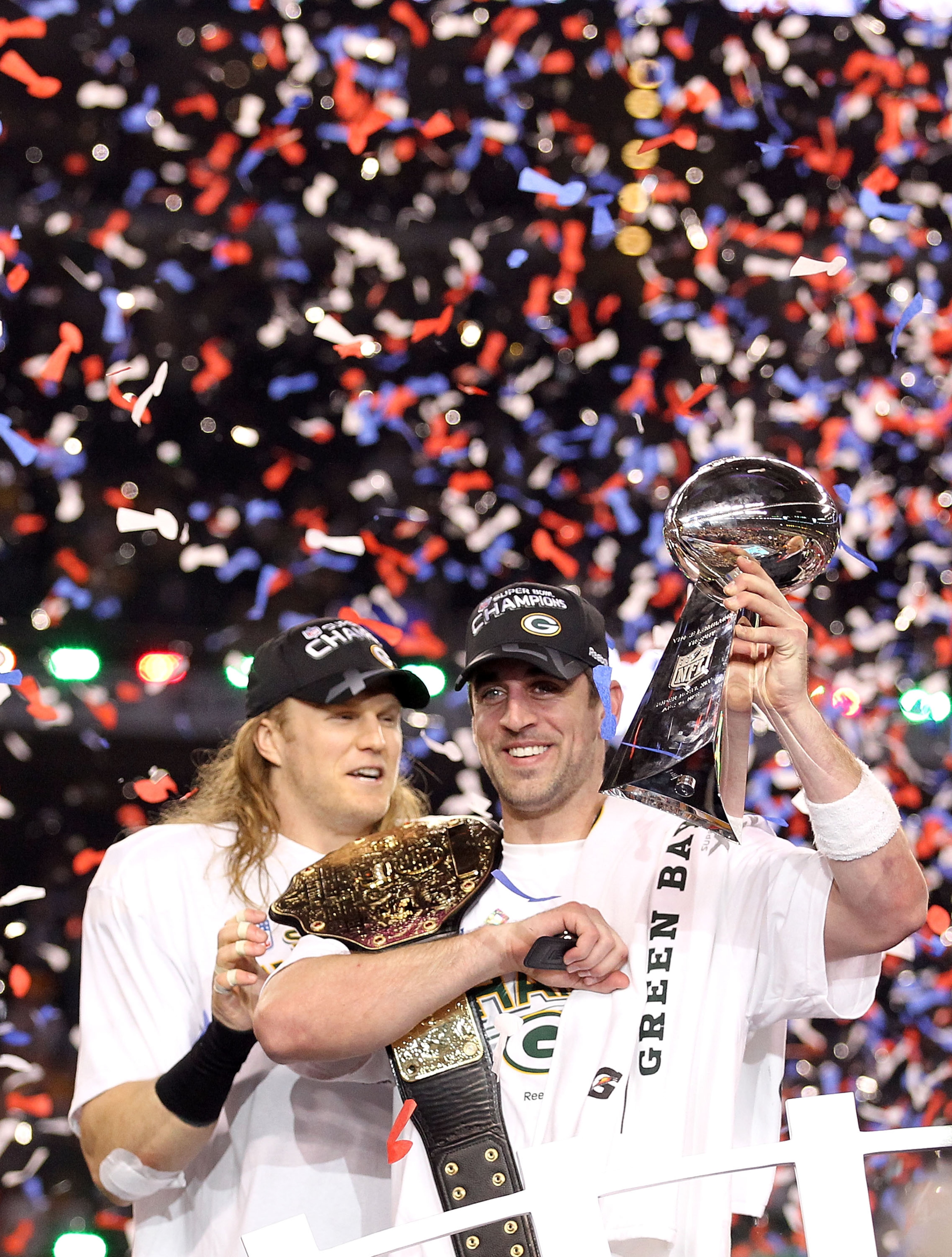 ARLINGTON, TX - FEBRUARY 06: Super Bowl MVP Aaron Rodgers #12 (R) and Clay Matthews #52 of the Green Bay Packers celebrate with the Lombardi Trophy after winning Super Bowl XLV 31-25 against the Pittsburgh Steelers at Cowboys Stadium on February 6, 2011 ARLINGTON, TX - FEBRUARY 06: Super Bowl MVP Aaron Rodgers #12 (R) and Clay Matthews #52 of the Green Bay Packers celebrate with the Lombardi Trophy after winning Super Bowl XLV 31-25 against the Pittsburgh Steelers at Cowboys Stadium on February 6, 2011