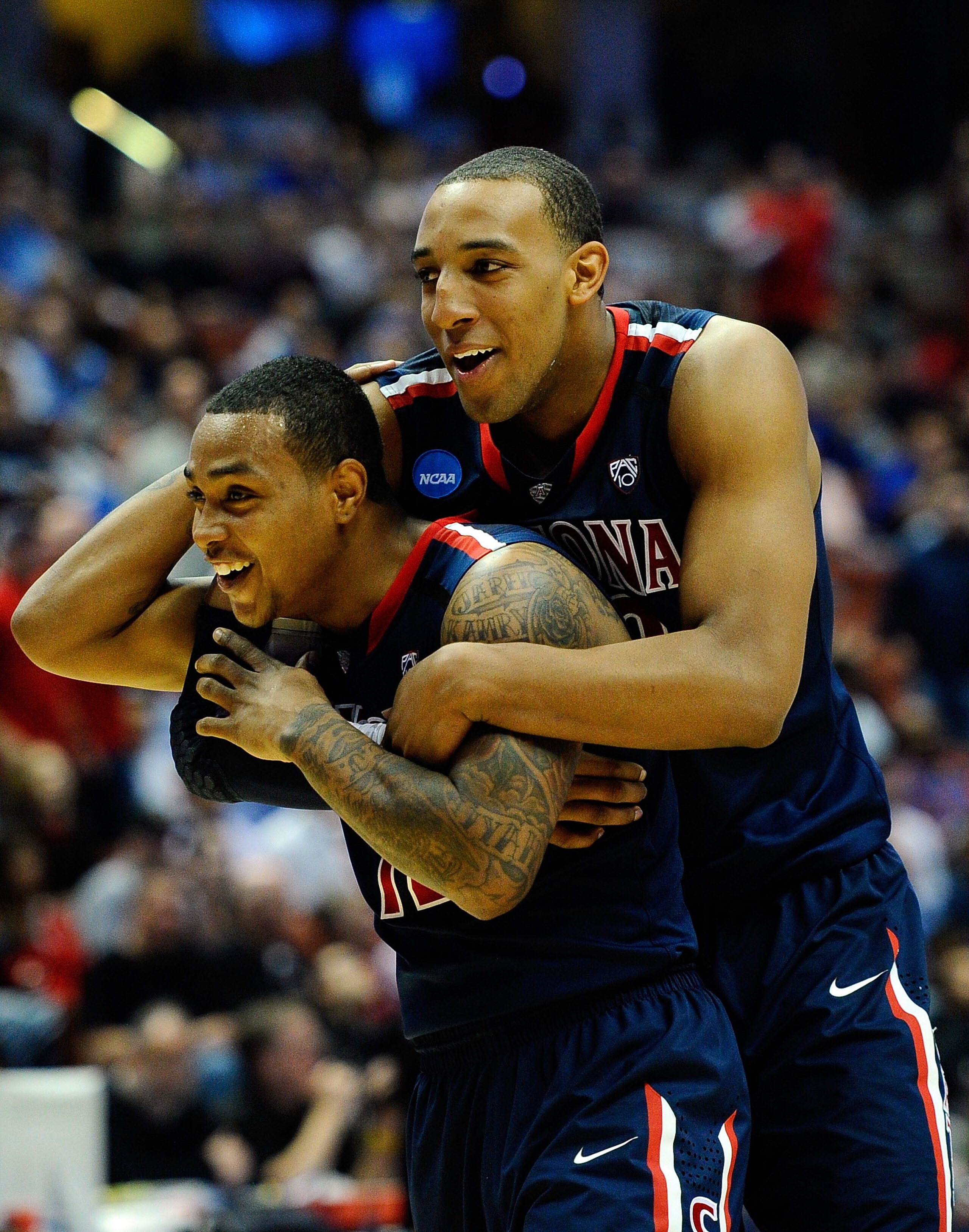 ANAHEIM, CA - MARCH 24: Lamont Jones #12 and Derrick Williams #23 of the Arizona Wildcats reacts after a play against the Duke Blue Devils during the west regional semifinal of the 2011 NCAA men's basketball tournament at the Honda Center on March 24, 20 ANAHEIM, CA - MARCH 24: Lamont Jones #12 and Derrick Williams #23 of the Arizona Wildcats reacts after a play against the Duke Blue Devils during the west regional semifinal of the 2011 NCAA men's basketball tournament at the Honda Center on March 24, 20