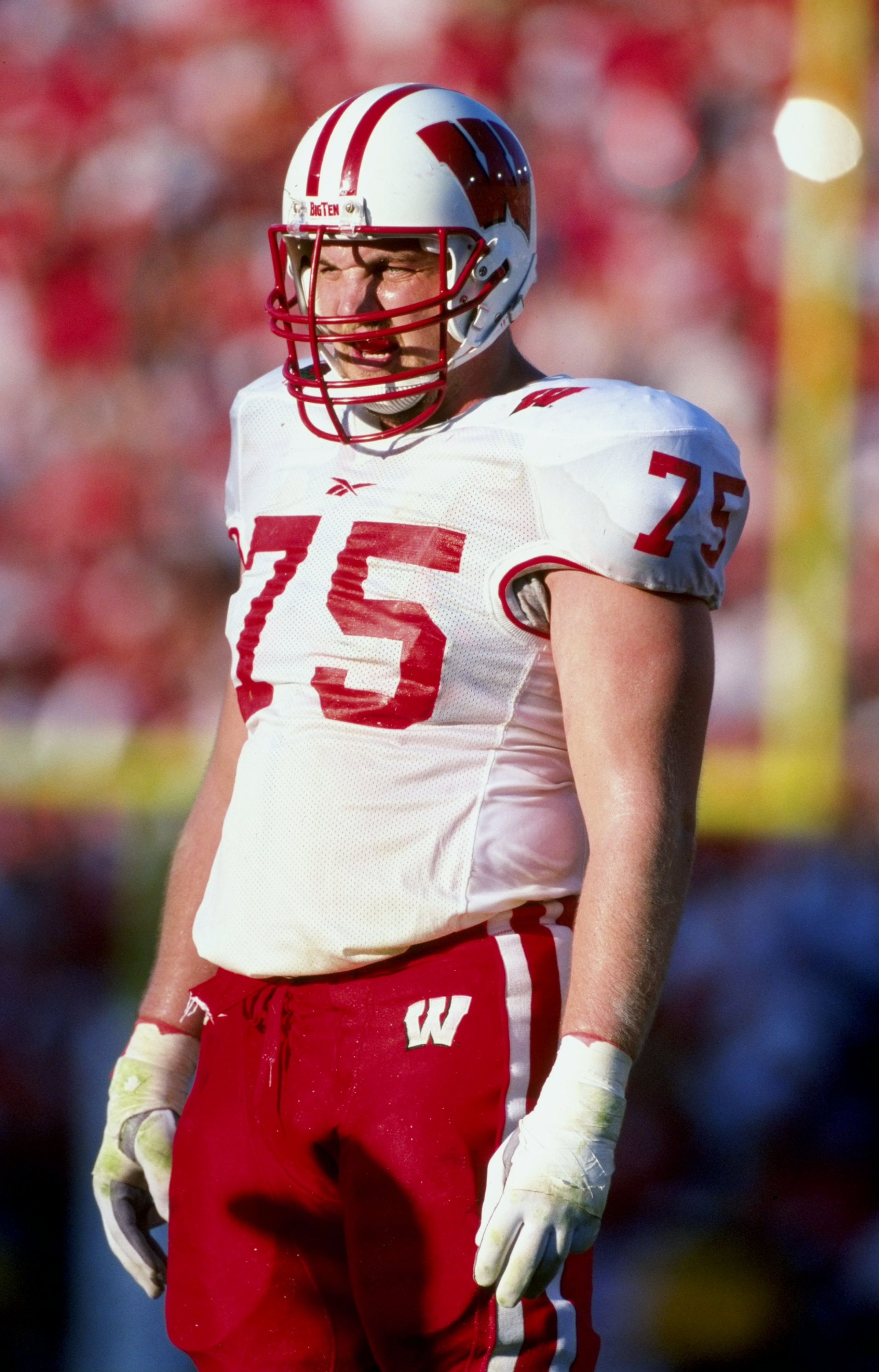 1 Jan 1999:  Chris McIntosh #75 of the Wisconsin Badgers standing there looking on during the Rose Bowl Game against the UCLA Bruins at the Rose Bowl in Pasadena, California. The Badgers defeated the Bruins 38-31. Mandatory Credit: Tom Hauck  /Allsport