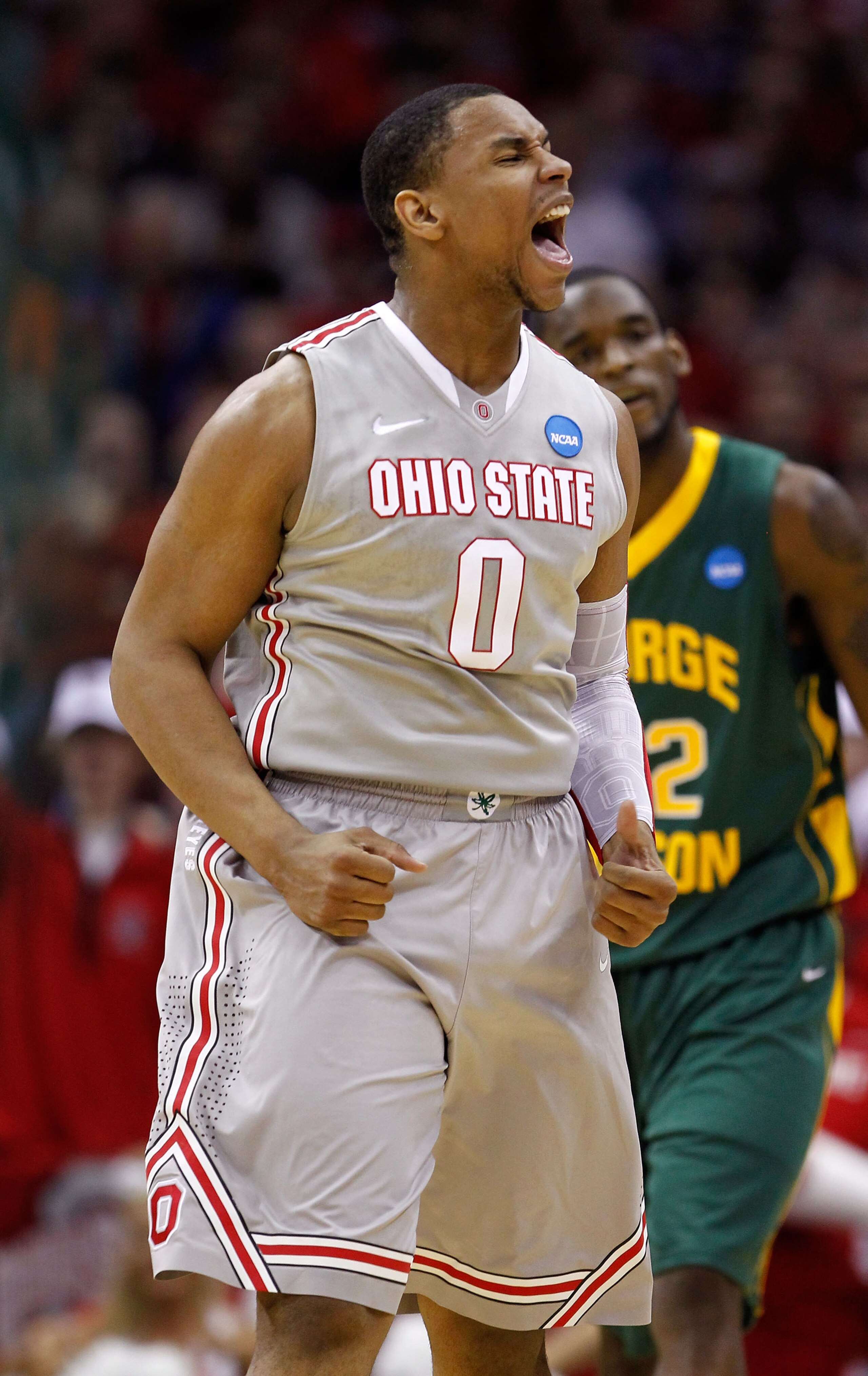 CLEVELAND, OH - MARCH 20: Jared Sullinger #0 of the Ohio State Buckeyes reacts after a play against the George Mason Patriots during the third of the 2011 NCAA men's basketball tournament at Quicken Loans Arena on March 20, 2011 in Cleveland, Ohio. (Phot CLEVELAND, OH - MARCH 20: Jared Sullinger #0 of the Ohio State Buckeyes reacts after a play against the George Mason Patriots during the third of the 2011 NCAA men's basketball tournament at Quicken Loans Arena on March 20, 2011 in Cleveland, Ohio. (Phot