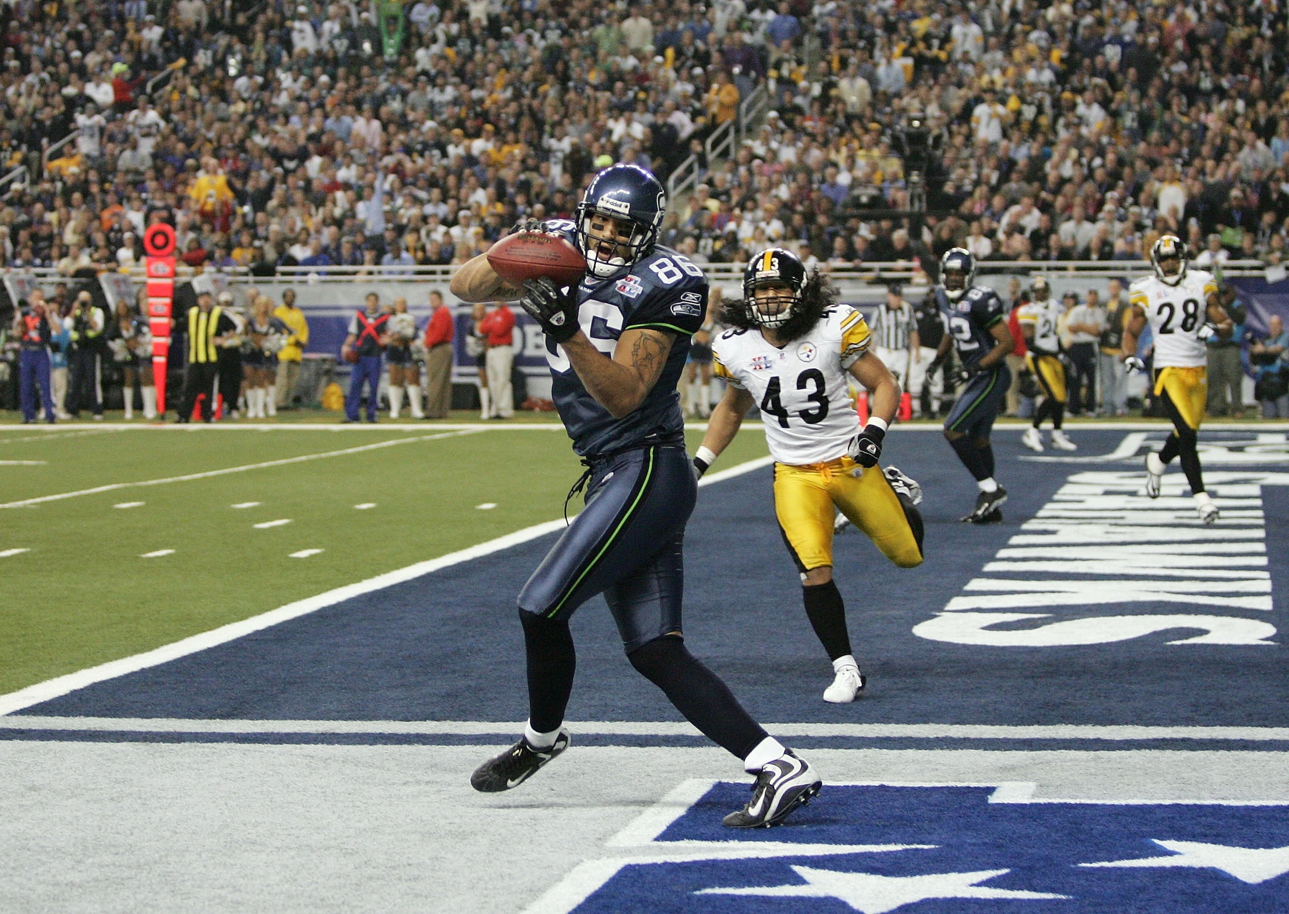 DETROIT - FEBRUARY 5:  Tight end Jerramy Stevens #86 of the Seattle Seahawks catches a 16-yard touchdown pass against Troy Polamalu #43 of the Pittsburgh Steelers during the third quarter in Super Bowl XL at Ford Field on February 5, 2006 in Detroit, Mich