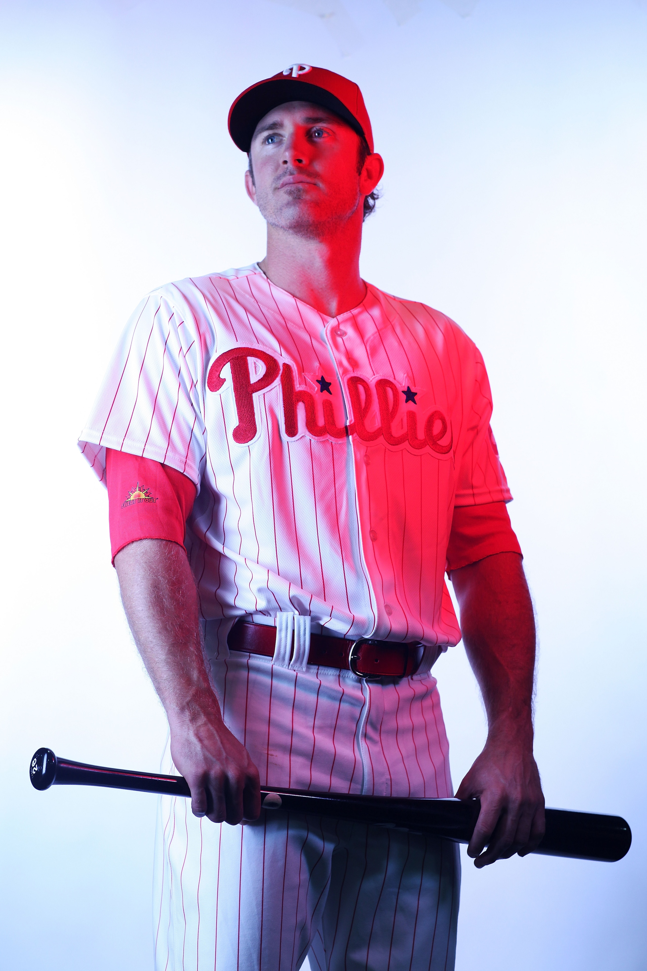 CLEARWATER, FL - FEBRUARY 22: (EDITORS NOTE: Image was shot with a colored gel on lights) Chase Utley #26 of the Philadelphia Phillies poses for a photo during Spring Training Media Photo Day at Bright House Networks Field on February 22, 2011 in Clearwa CLEARWATER, FL - FEBRUARY 22: (EDITORS NOTE: Image was shot with a colored gel on lights) Chase Utley #26 of the Philadelphia Phillies poses for a photo during Spring Training Media Photo Day at Bright House Networks Field on February 22, 2011 in Clearwa