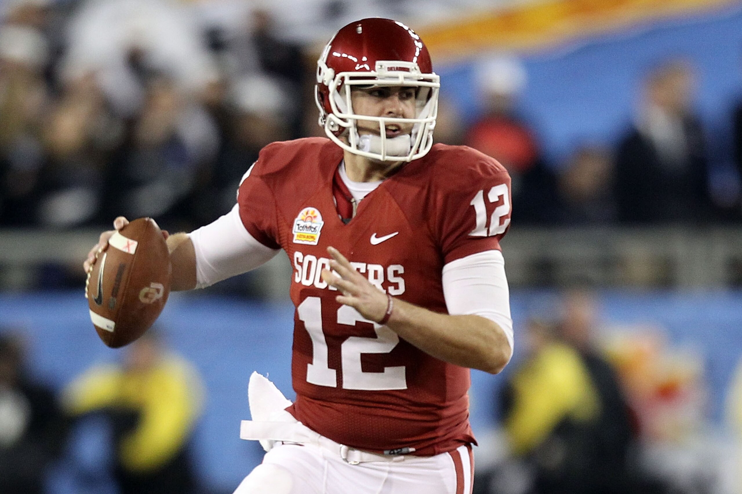 GLENDALE, AZ - JANUARY 01: Landry Jones #12 of the Oklahoma Sooners throws the ball against the Connecticut Huskies during the Tostitos Fiesta Bowl at the Universtity of Phoenix Stadium on January 1, 2011 in Glendale, Arizona. (Photo by Christian Peters GLENDALE, AZ - JANUARY 01: Landry Jones #12 of the Oklahoma Sooners throws the ball against the Connecticut Huskies during the Tostitos Fiesta Bowl at the Universtity of Phoenix Stadium on January 1, 2011 in Glendale, Arizona. (Photo by Christian Peters