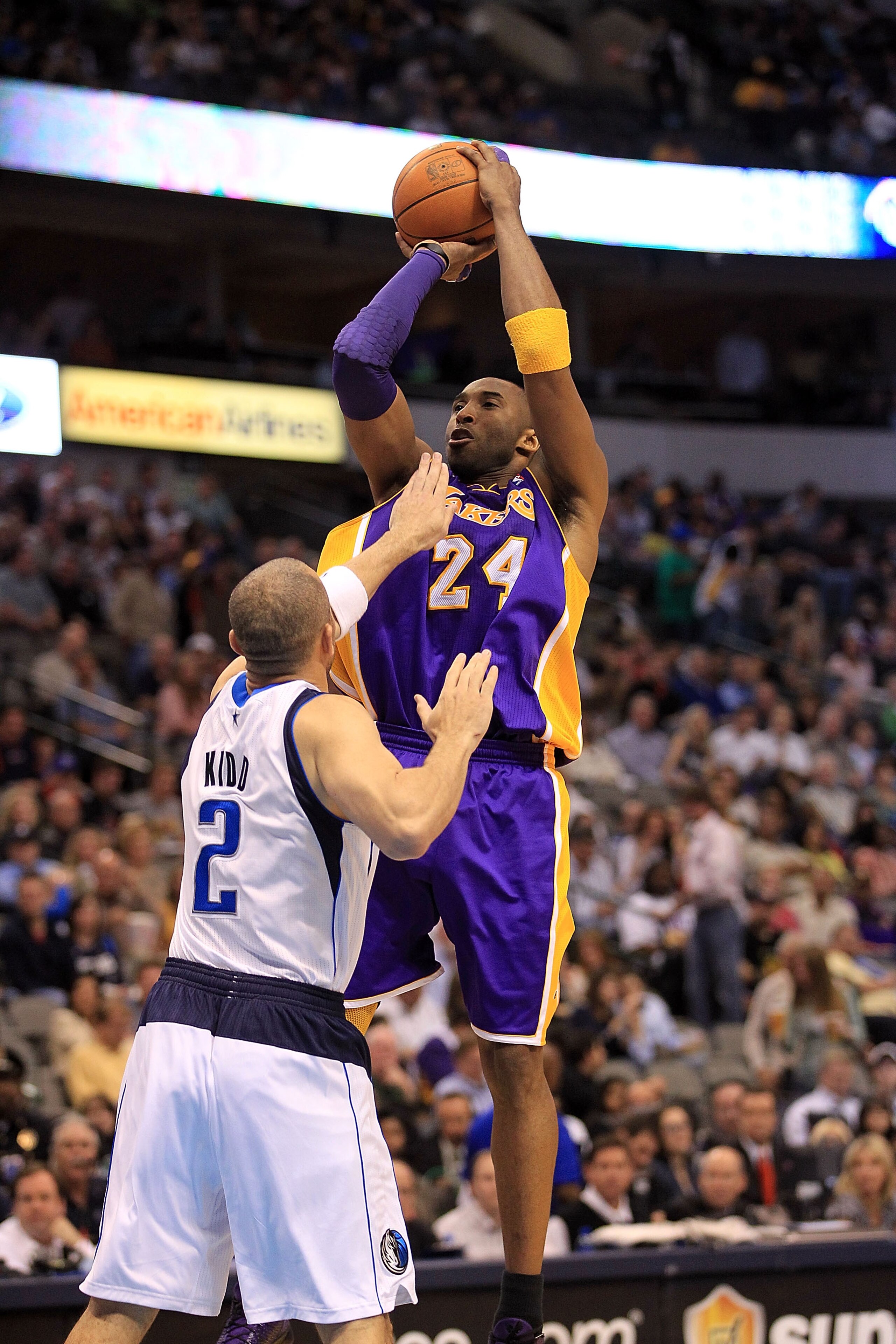 DALLAS, TX - MARCH 12:  Guard Kobe Bryant #24 of the Los Angeles Lakers takes a shot against Jason Kidd #2 of the Dallas Mavericks at American Airlines Center on March 12, 2011 in Dallas, Texas.  NOTE TO USER: User expressly acknowledges and agrees that,