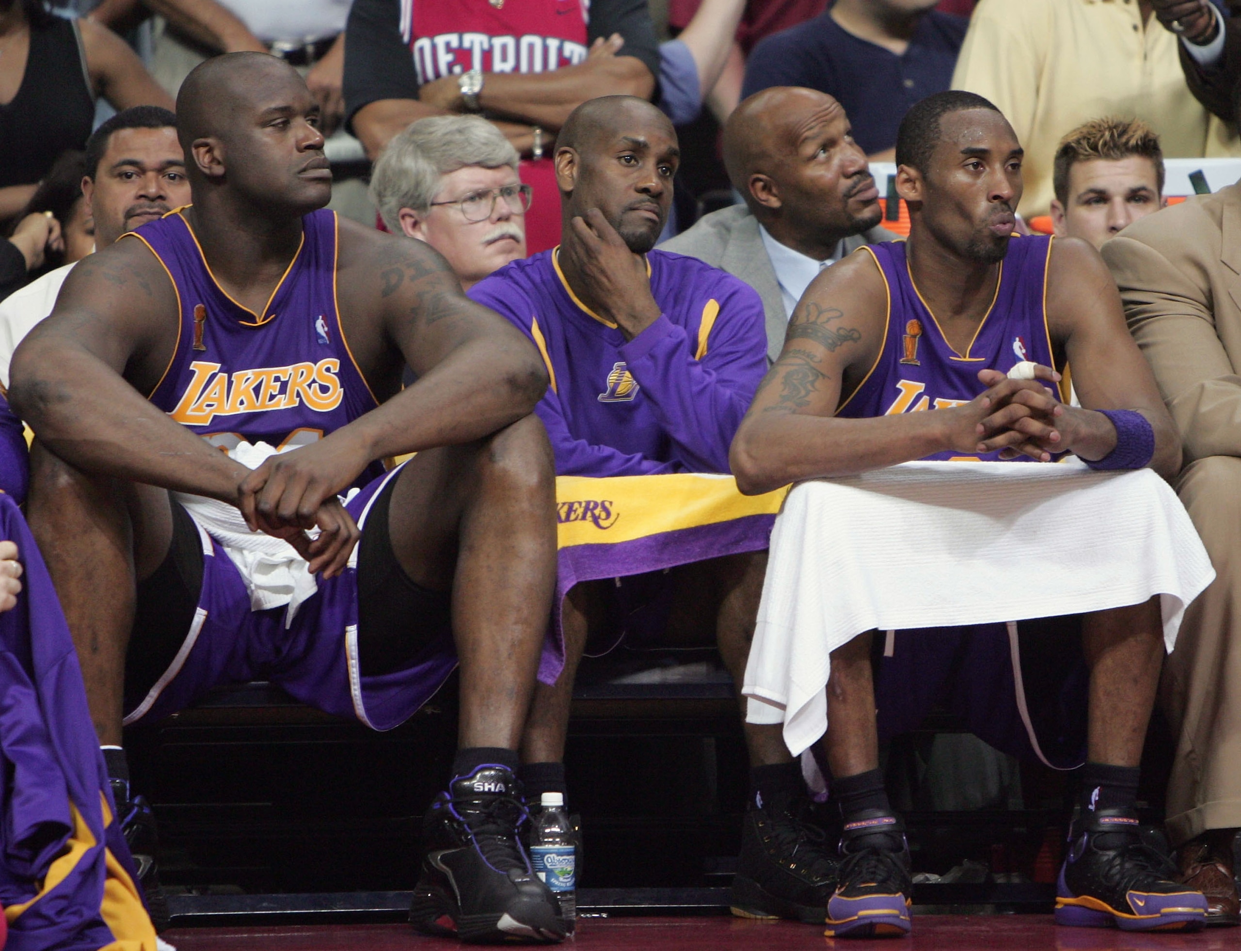 AUBURN HILLS, MI - JUNE 15: (L-R) Shaquille O'Neal #34, Gary Payton #20 and Kobe Bryant #8 of the Los Angeles Lakers look on from the bench in the fourth quarter of game five of the 2004 NBA Finals against the Detroit Pistons on June 15, 2004 at The Palac