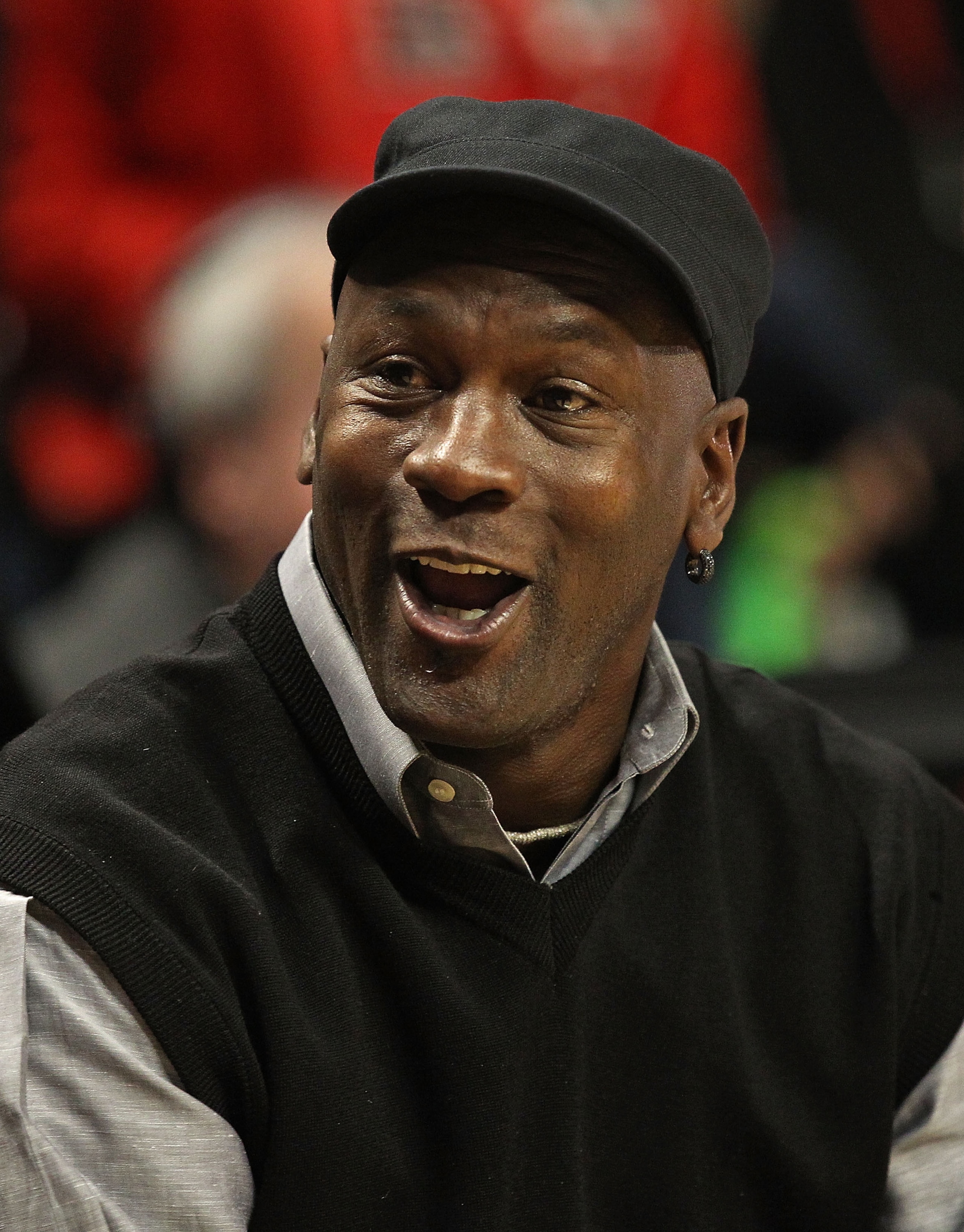 CHICAGO, IL - FEBRUARY 15: Former player Michael Jordan of the Chicago Bulls talks to a fan before the Bulls take on the Charlotte Bobcats at the United Center on February 15, 2011 in Chicago, Illinois. NOTE TO USER: User expressly acknowledges and agrees CHICAGO, IL - FEBRUARY 15: Former player Michael Jordan of the Chicago Bulls talks to a fan before the Bulls take on the Charlotte Bobcats at the United Center on February 15, 2011 in Chicago, Illinois. NOTE TO USER: User expressly acknowledges and agrees
