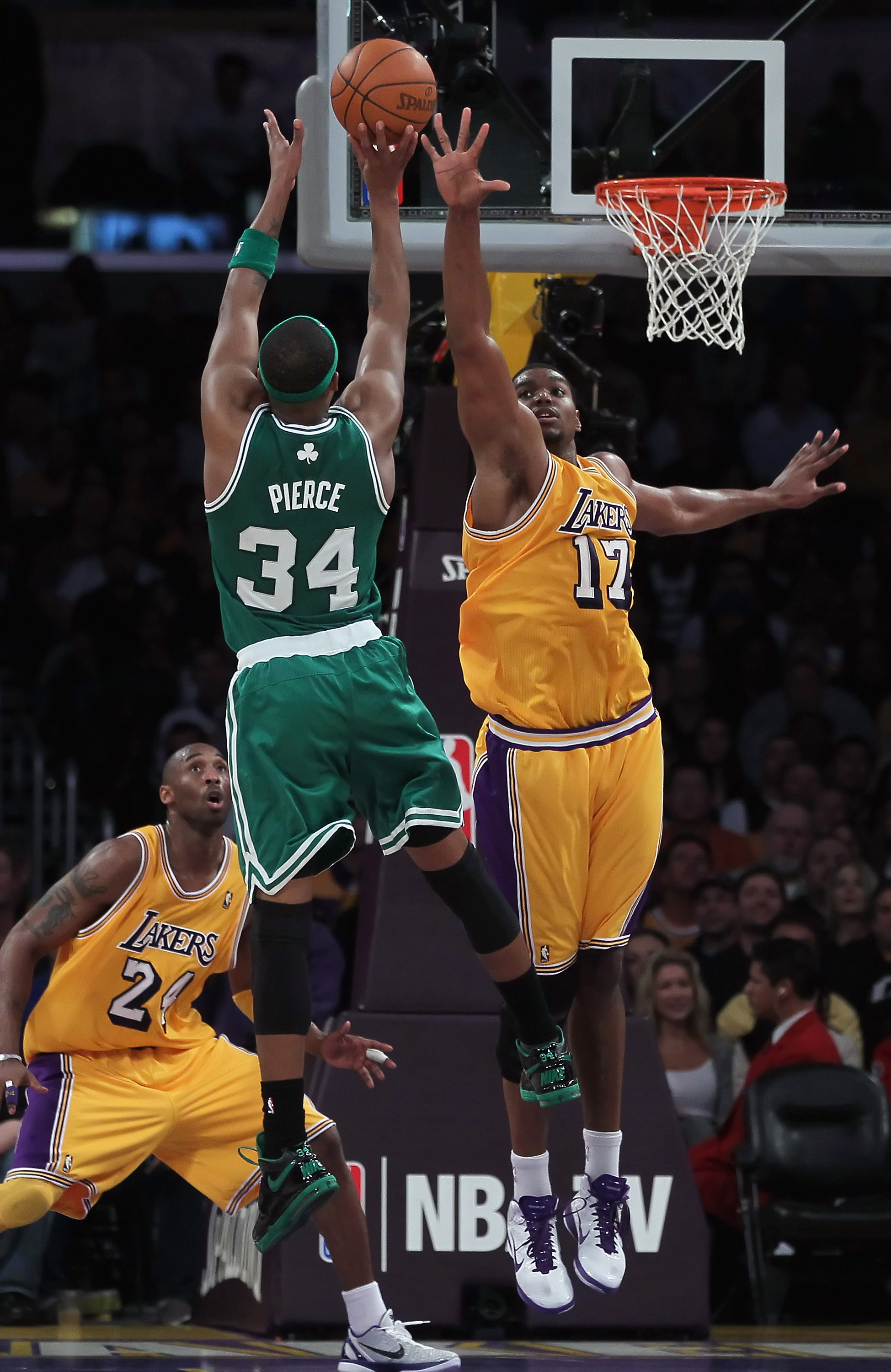 LOS ANGELES, CA - JANUARY 30:  Paul Pierce #34 of the Boston Celtics shoots over Andrew Bynum #17 of the Los Angeles Lakers in the first half at Staples Center on January 30, 2011 in Los Angeles, California. The Celtics defeated the Lakers 109-96.  (Photo