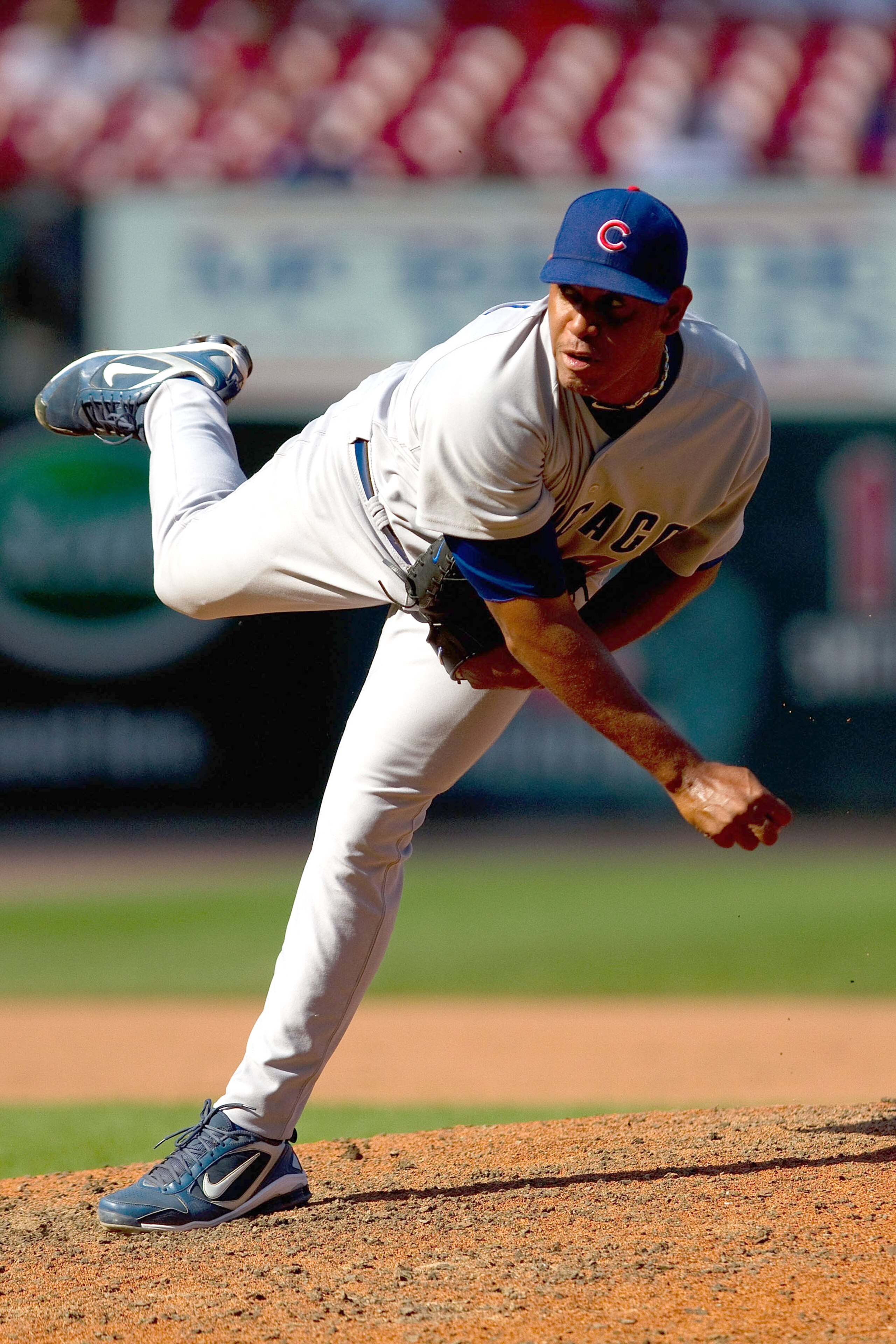 ST. LOUIS - AUGUST 15: Relief pitcher Carlos Marmol #49 of the Chicago Cubs throws against the St. Louis Cardinals at Busch Stadium on August 15, 2010 in St. Louis, Missouri.  The Cubs beat the Cardinals 9-7.  (Photo by Dilip Vishwanat/Getty Images)