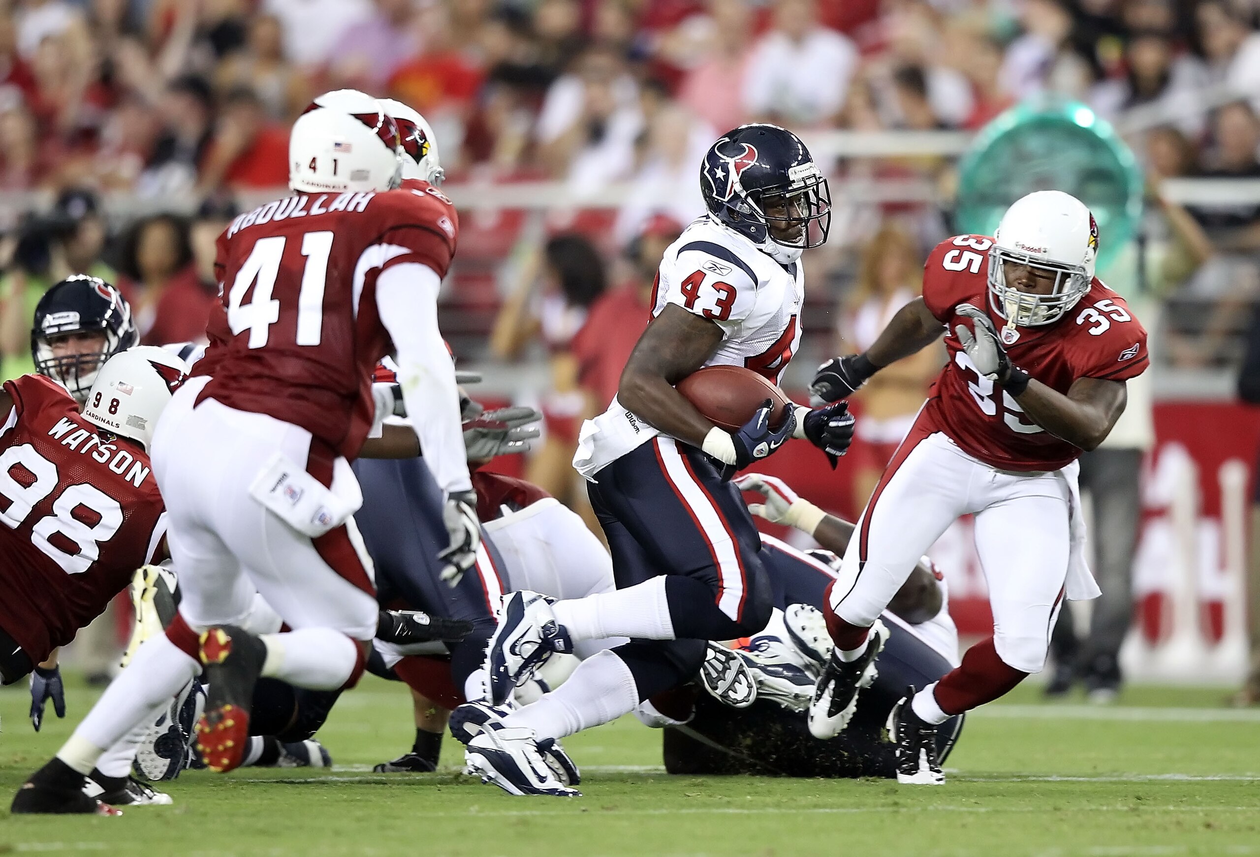 GLENDALE, AZ - AUGUST 14:  Runningback Ben Tate #43 of the Houston Texans rushes the ball against the Arizona Cardinals during preseason NFL game at the University of Phoenix Stadium on August 14, 2010 in Glendale, Arizona.  The Cardinals defeated the Tex