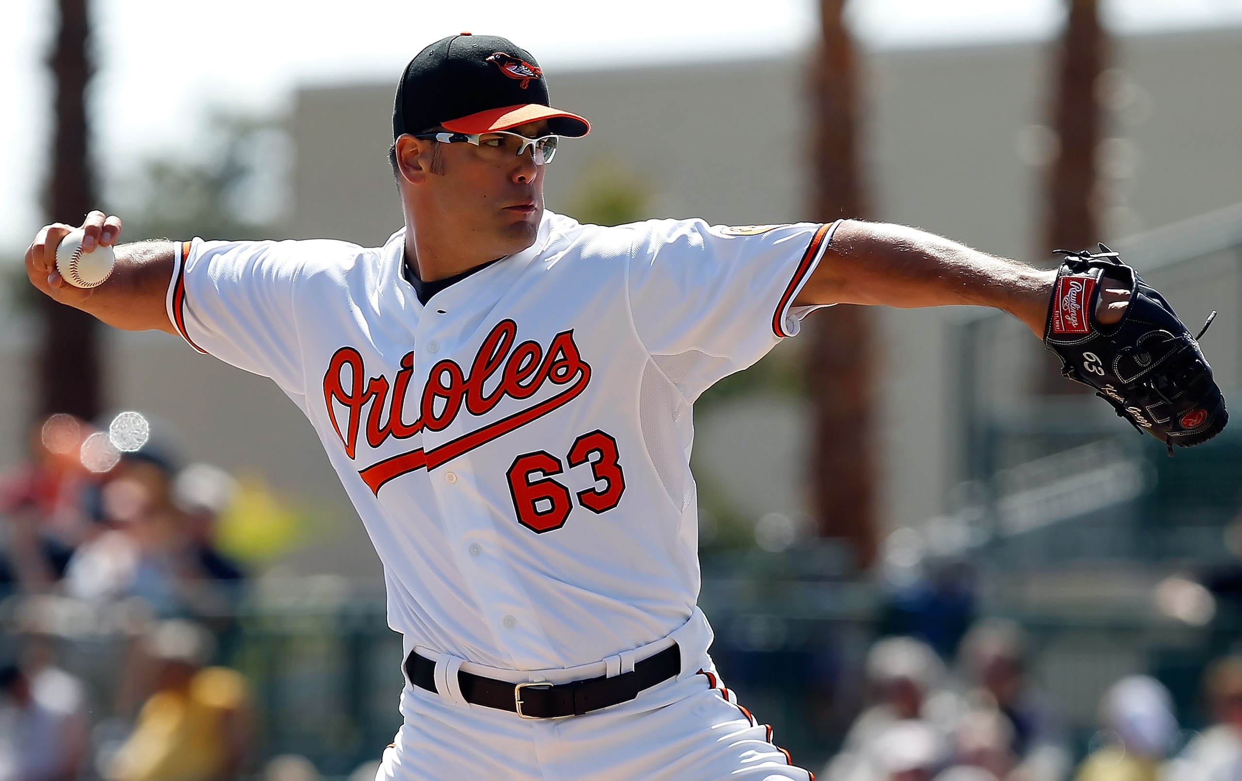 SARASOTA, FL - MARCH 03:  Pitcher Kevin Gregg #63 of the Baltimore Orioles pitches against the Minnesota Twins during a Grapefruit League Spring Training Game at Ed Smith Stadium on March 3, 2011 in Sarasota, Florida.  (Photo by J. Meric/Getty Images)