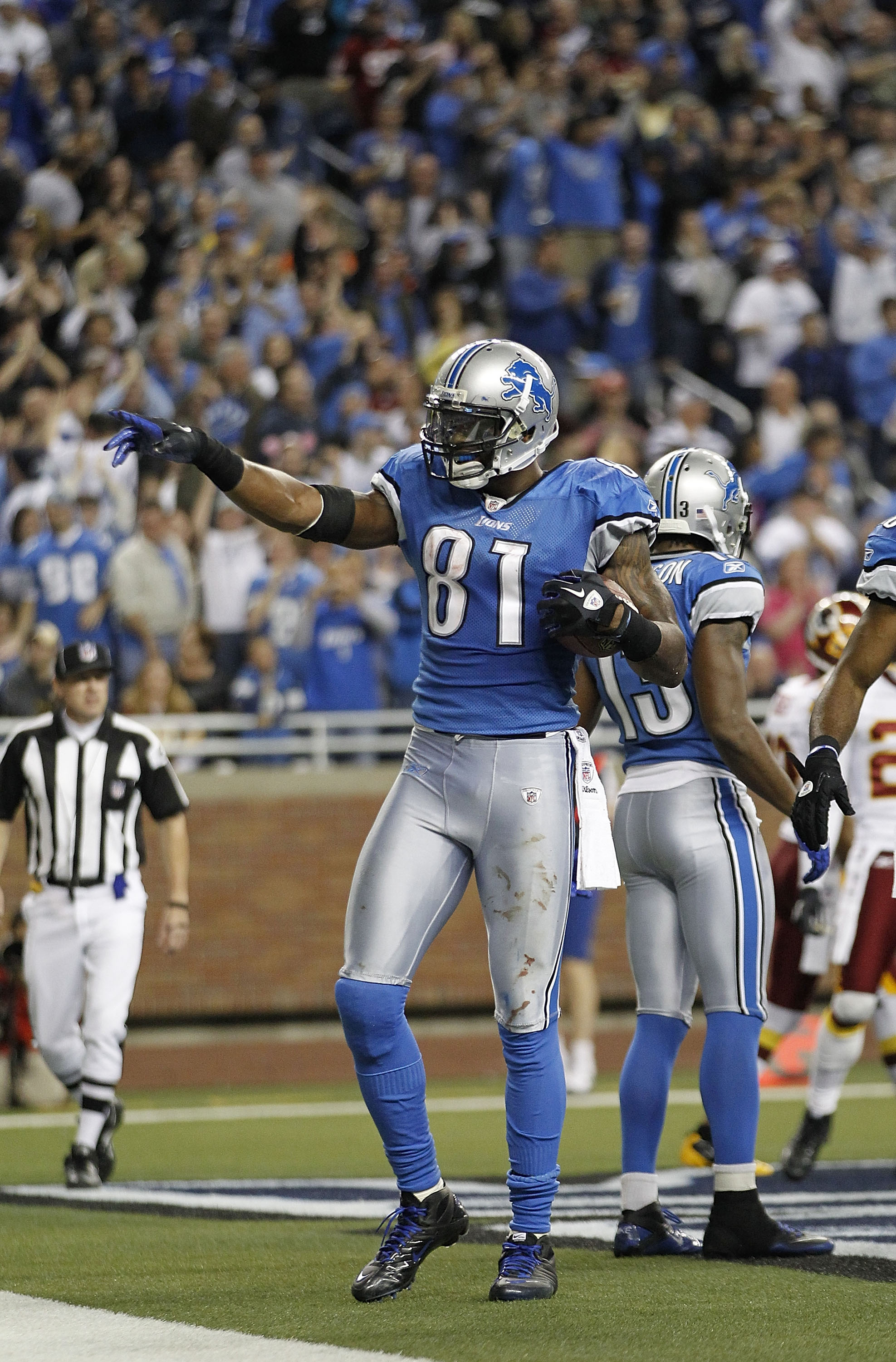 Matthew Stafford and Calvin Johnson of the Detroit Lions celebrate