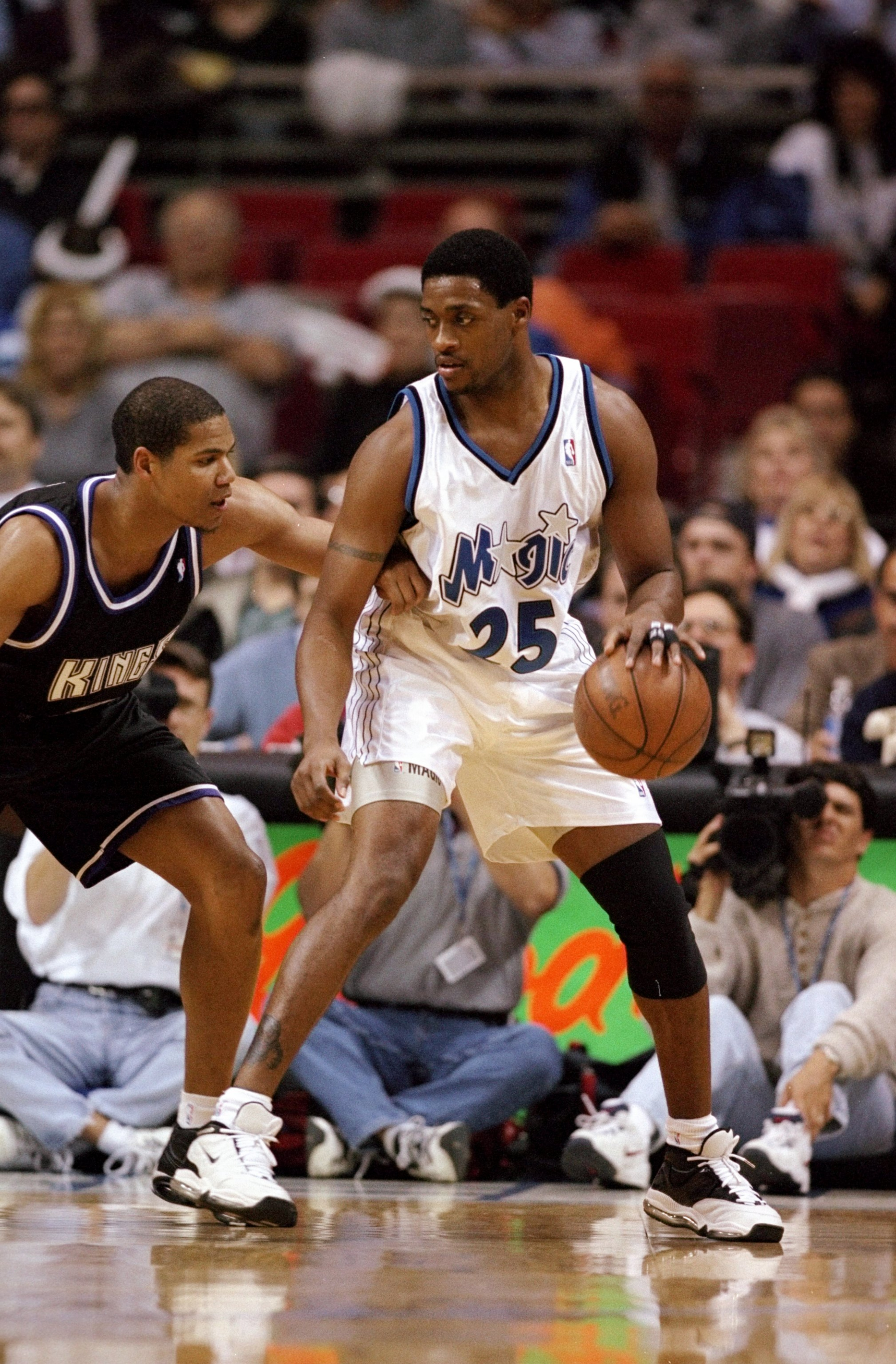 22 Feb 1999:  Nick Anderson #25 of the Orlando Magic dribbles the balll during the game against the Sacramento Kings at the Orlando Arena in Orlando, Florida. The Magic defeated the Kings 107-96.  Mandatory Credit: Andy Lyons  /Allsport