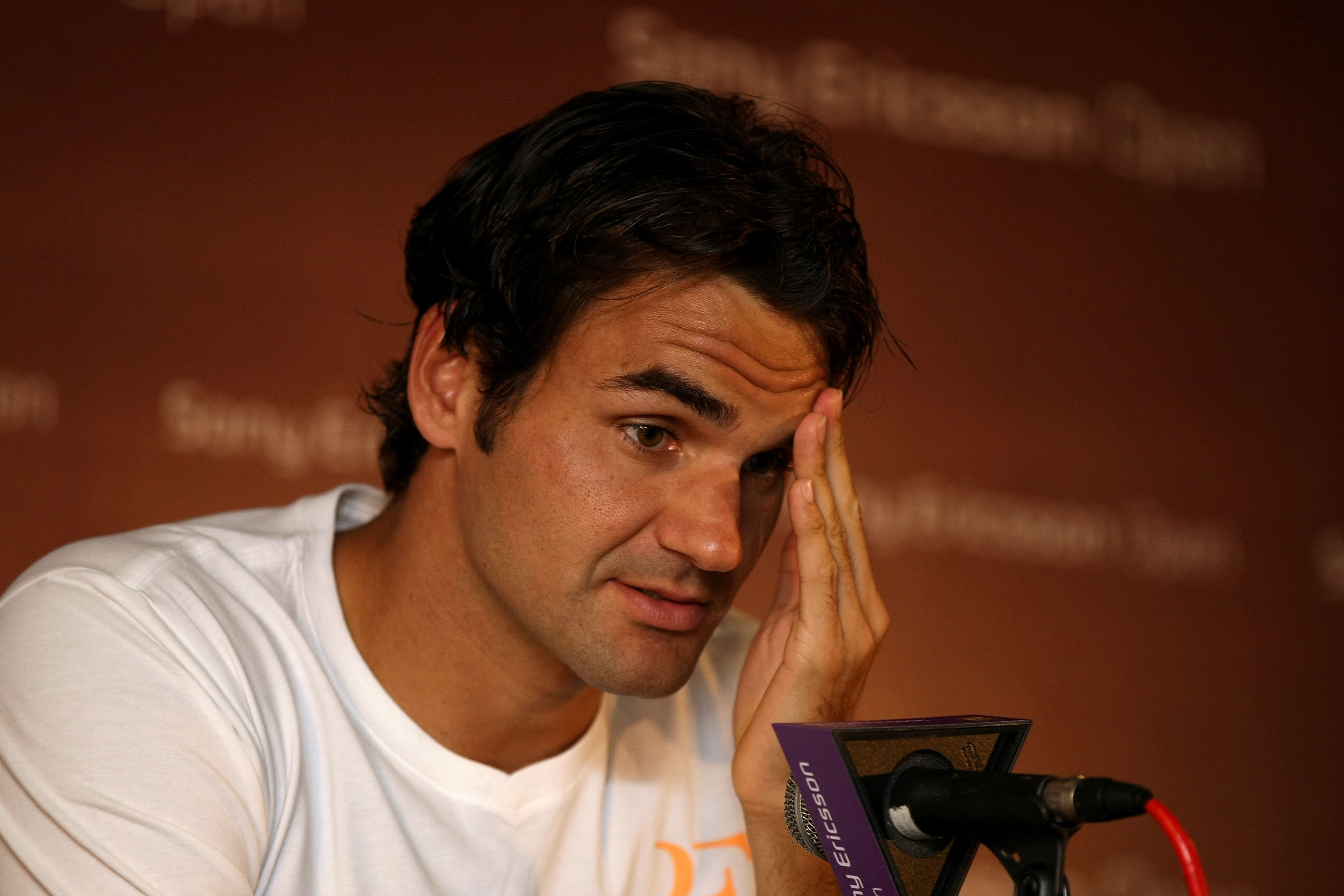 KEY BISCAYNE, FL - MARCH 23:  Roger Federer of Switzerland answers questions at a press conference during the Sony Ericsson Open at Crandon Park Tennis Center on March 23, 2011 in Key Biscayne, Florida.  (Photo by Al Bello/Getty Images)