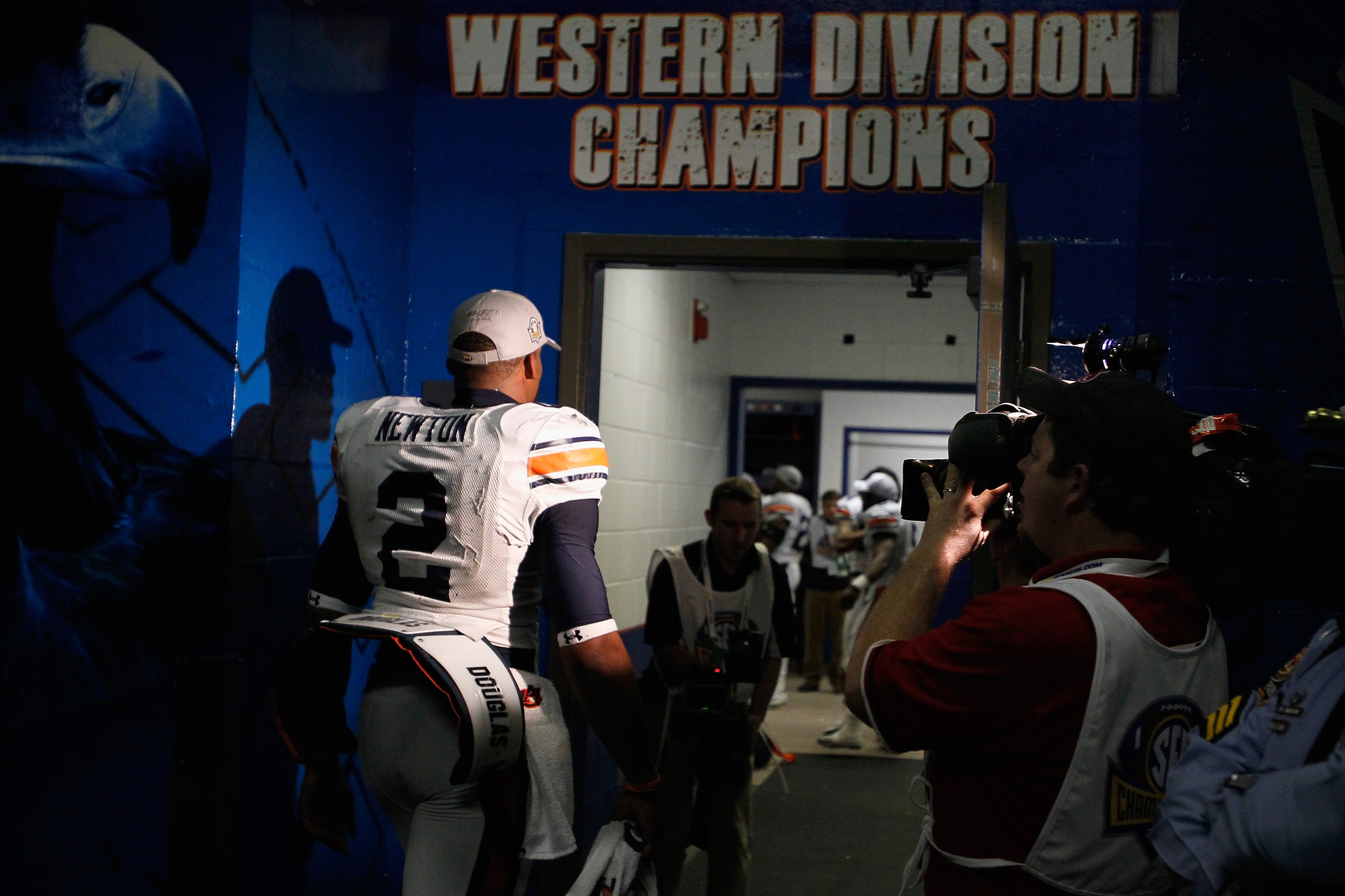 ATLANTA, GA - DECEMBER 04:  Quarterback Cam Newton #2 of the Auburn Tigers enters the locker room after their 56-17 win over the South Carolina Gamecocks during the 2010 SEC Championship at Georgia Dome on December 4, 2010 in Atlanta, Georgia.  (Photo by