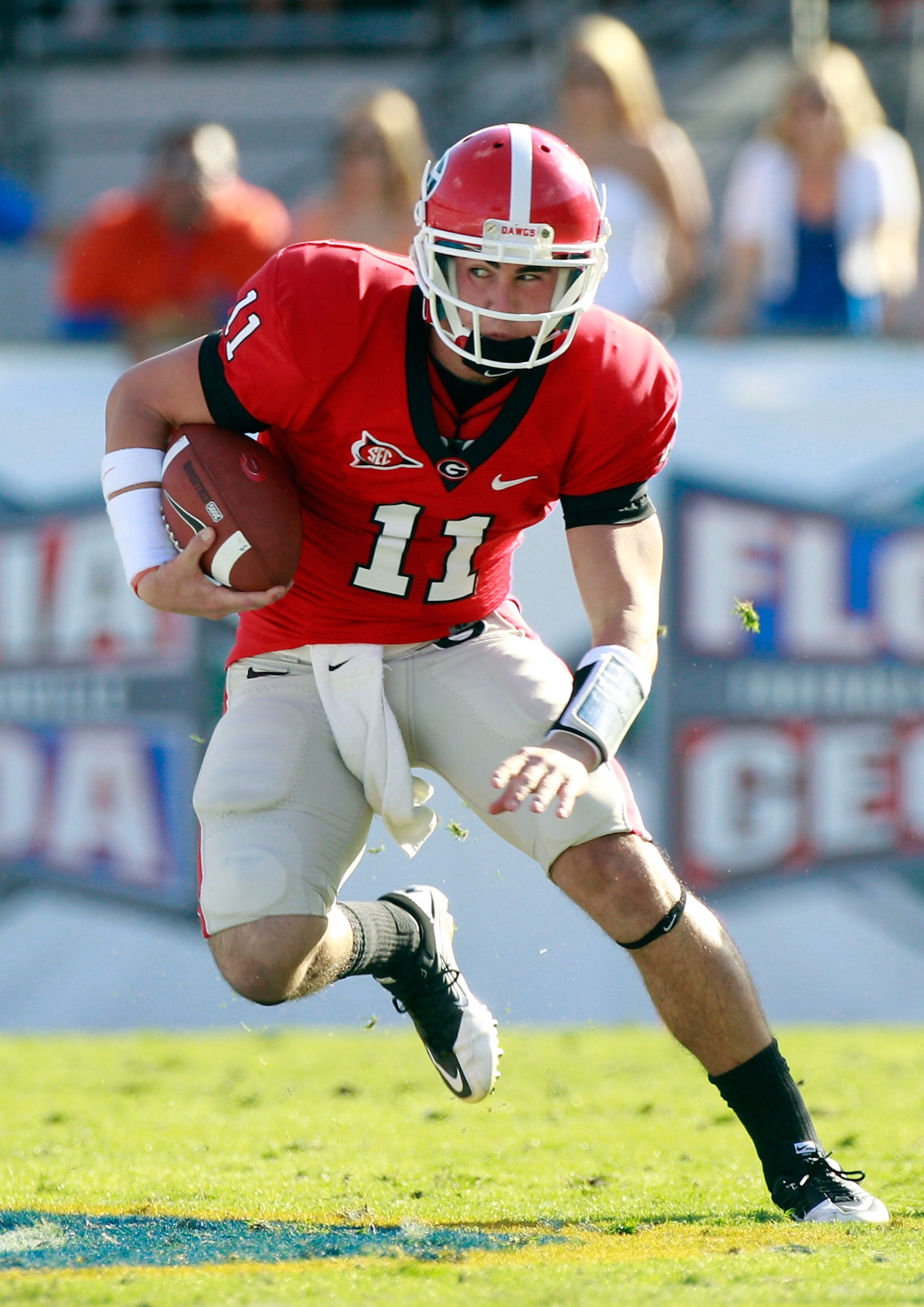 JACKSONVILLE, FL - OCTOBER 30:  Quarterback Aaron Murray #11 of the Georgia Bulldogs runs for yardage during the game against the Florida Gators at EverBank Field on October 30, 2010 in Jacksonville, Florida.  (Photo by Sam Greenwood/Getty Images)