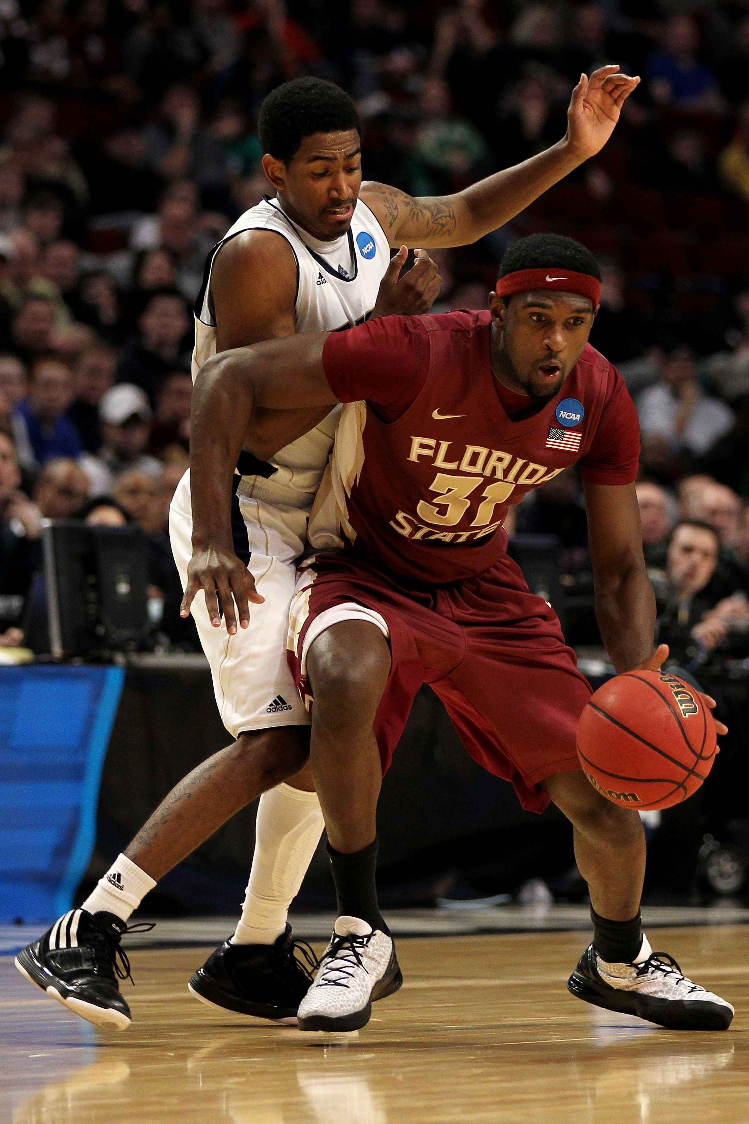 CHICAGO, IL - MARCH 20: Chris Singleton #31 of the Florida State Seminoles drives against the Notre Dame Fighting Irish in the second half during the third round of the 2011 NCAA men's basketball tournament at the United Center on March 20, 2011 in Chicag