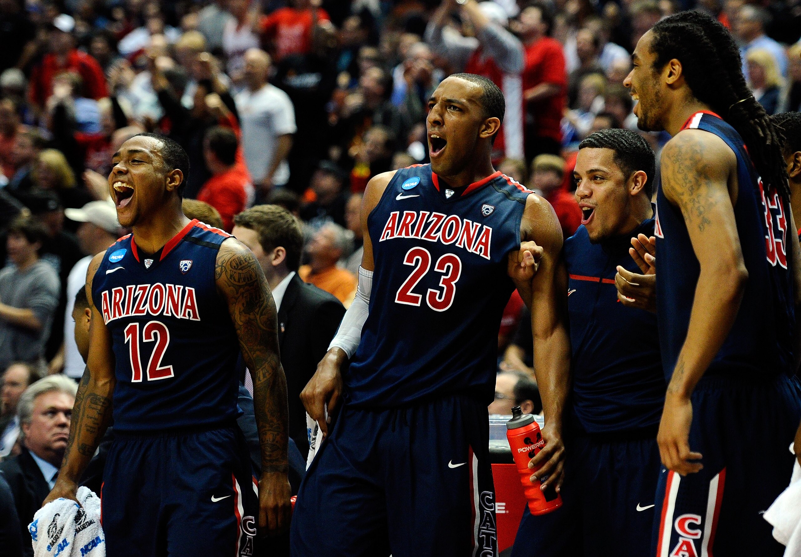 ANAHEIM, CA - MARCH 24:  Lamont Jones #12 and Derrick Williams #23 of the Arizona Wildcats reacts from the bench after a play against the Duke Blue Devils during the west regional semifinal of the 2011 NCAA men's basketball tournament at the Honda Center