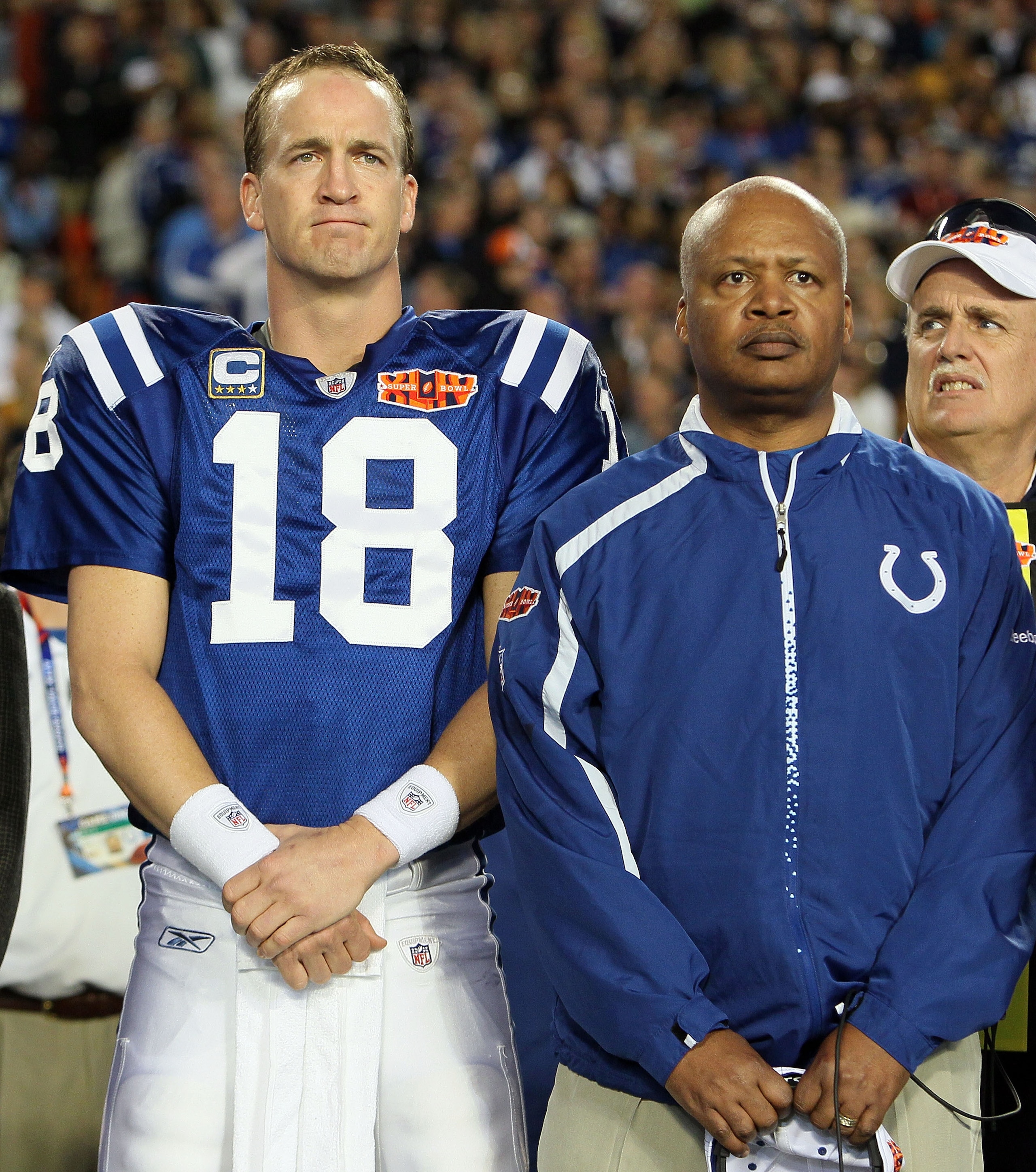 MIAMI GARDENS, FL - FEBRUARY 07: Quarterback Peyton Manning #18 and head coach Jim Caldwell of the Indianapolis Colts look on prior to Super Bowl XLIV against the New Orleans Saints on February 7, 2010 at Sun Life Stadium in Miami Gardens, Florida.  (Phot