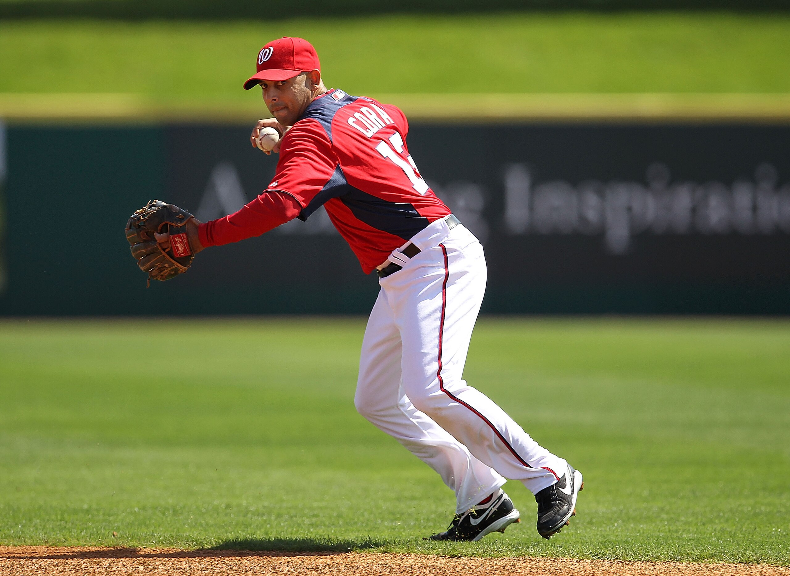 VIERA, FL - MARCH 02: Alex Cora #13 of the Washington Nationals makes a throw to first during a Spring Training game against the Florida Marlins at Space Coast Stadium on March 2, 2011 in Viera, Florida. (Photo by Mike Ehrmann/Getty Images) VIERA, FL - MARCH 02: Alex Cora #13 of the Washington Nationals makes a throw to first during a Spring Training game against the Florida Marlins at Space Coast Stadium on March 2, 2011 in Viera, Florida. (Photo by Mike Ehrmann/Getty Images)