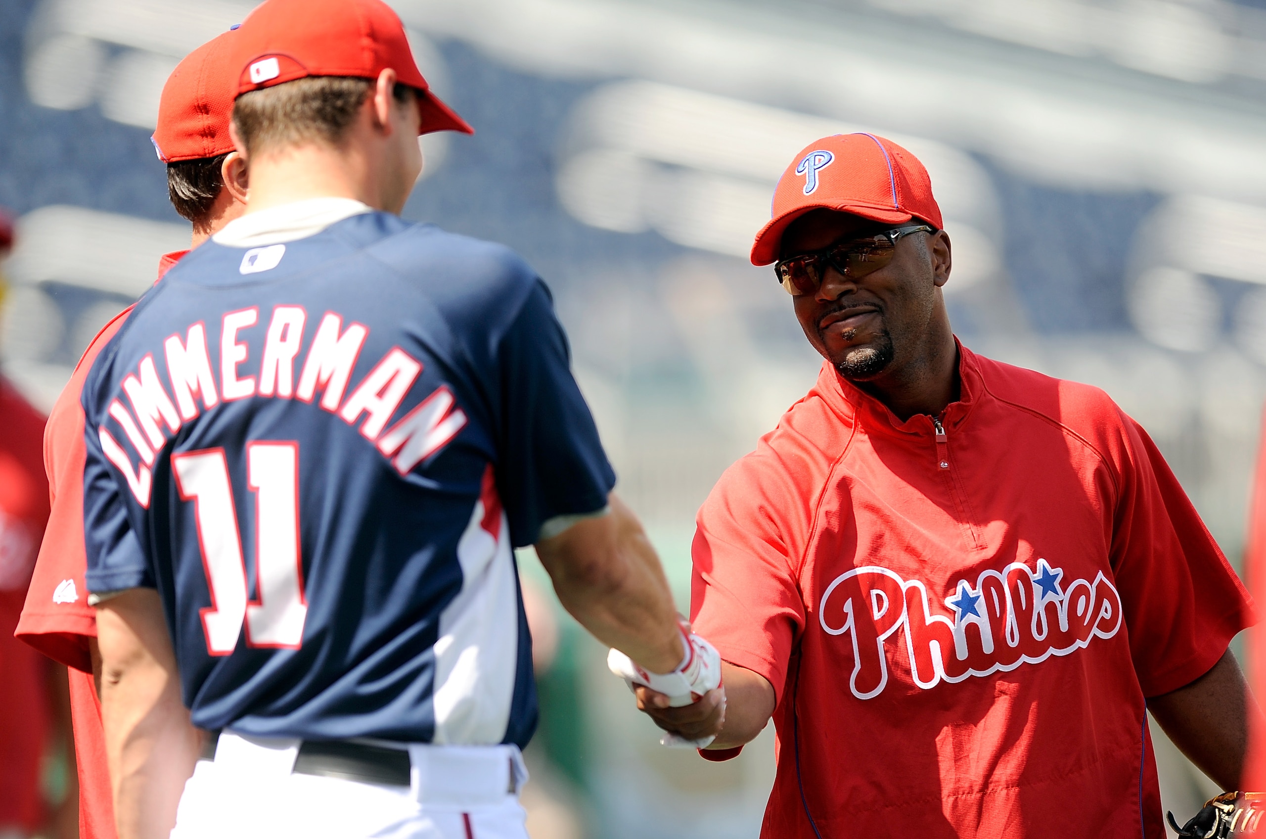WASHINGTON - APRIL 08: Jimmy Rollins #11 of the Philadelphia Phillies talks to Ryan Zimmerman #11 of the Washington Nationals before the game at Nationals Park on April 8, 2010 in Washington, DC. (Photo by Greg Fiume/Getty Images) WASHINGTON - APRIL 08: Jimmy Rollins #11 of the Philadelphia Phillies talks to Ryan Zimmerman #11 of the Washington Nationals before the game at Nationals Park on April 8, 2010 in Washington, DC. (Photo by Greg Fiume/Getty Images)