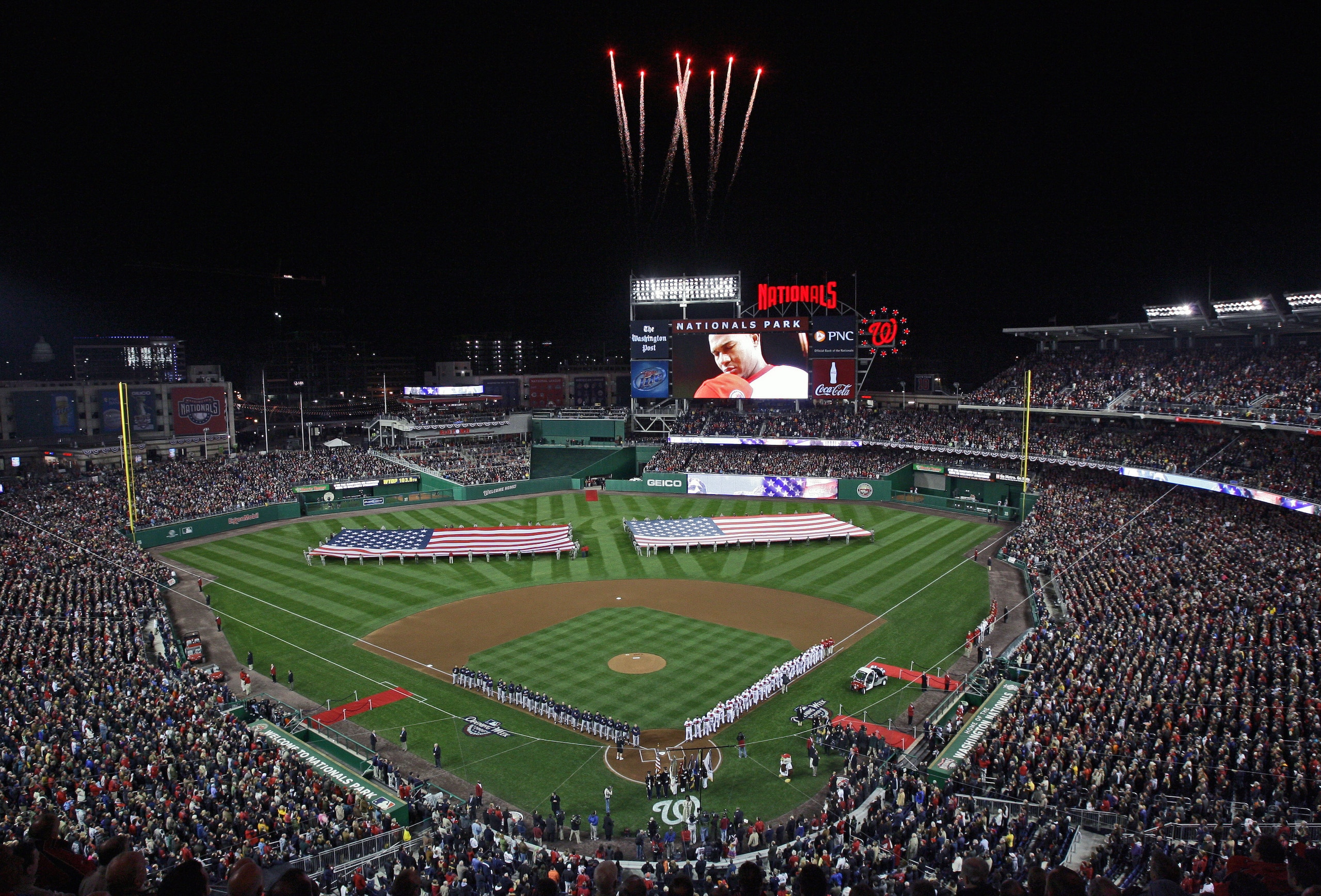 WASHINGTON - MARCH 30: Fireworks light the sky during the national anthem before the game between the Washington Nationals and Atlanta Braves on opening day March 30, 2008 at Nationals Park in Washington, DC. (Photo by Drew Hallowell/Getty Images) WASHINGTON - MARCH 30: Fireworks light the sky during the national anthem before the game between the Washington Nationals and Atlanta Braves on opening day March 30, 2008 at Nationals Park in Washington, DC. (Photo by Drew Hallowell/Getty Images)