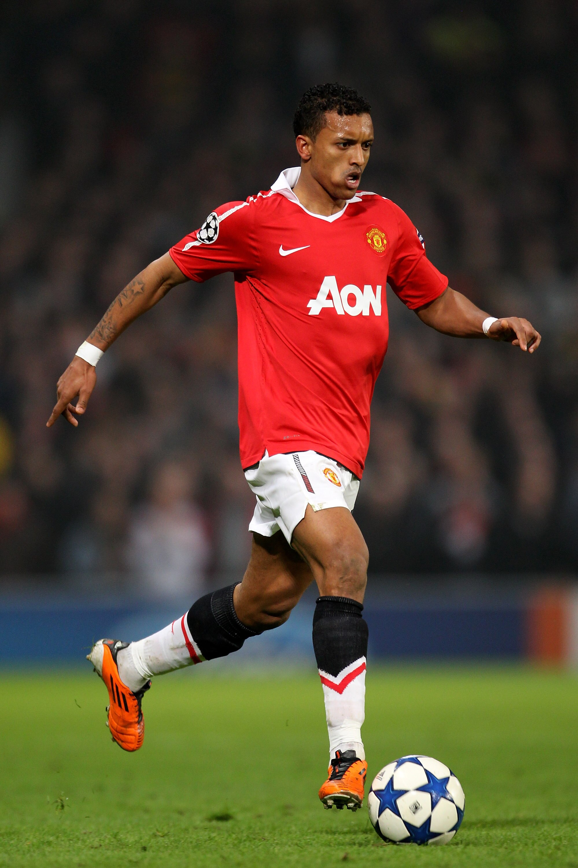 MANCHESTER, ENGLAND - MARCH 15:  Nani of Manchester United in action during the UEFA Champions League round of 16 second leg match between Manchester United and Marseille at Old Trafford on March 15, 2011 in Manchester, England.  (Photo by Alex Livesey/Ge