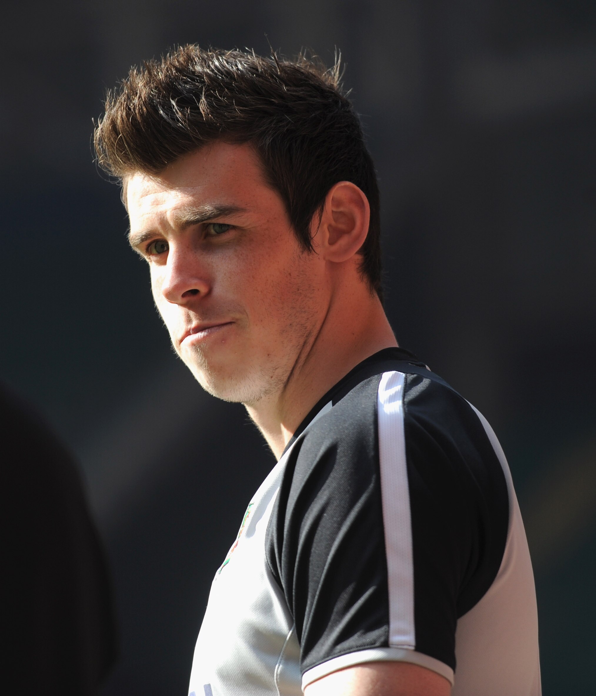 CARDIFF, WALES - MARCH 25:  Gareth Bale looks on as he sits out due to injury during the Wales training session ahead of their UEFA EURO 2012 qualifier against England on March 25, 2011 in Cardiff, Wales.  (Photo by Michael Regan/Getty Images)