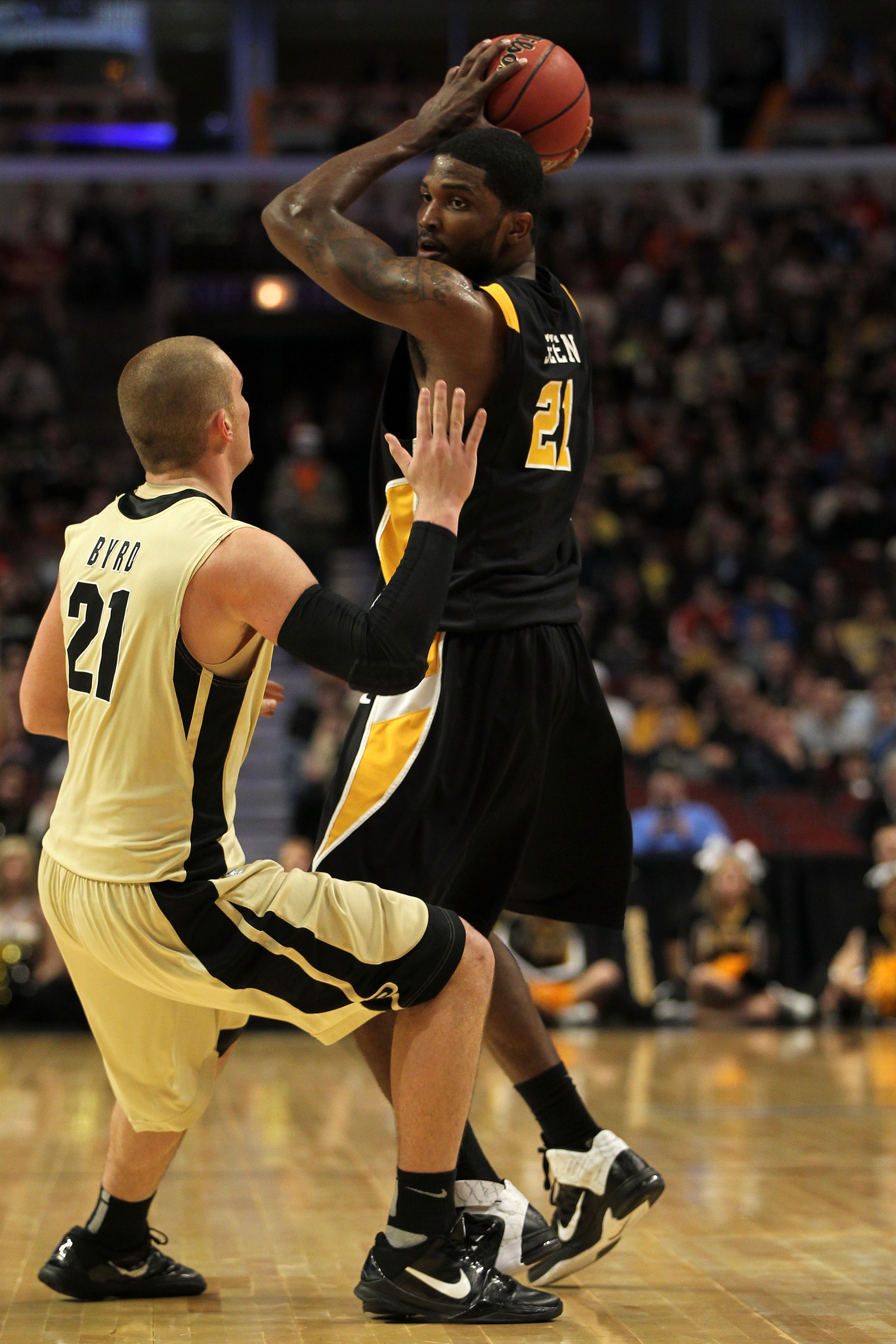 CHICAGO, IL - MARCH 20:  Jamie Skeen #21 of the Virginia Commonwealth Rams looks to pass against D.J. Byrd #21 of the Purdue Boilermakers in the first half during the third round of the 2011 NCAA men's basketball tournament at the United Center on March 2