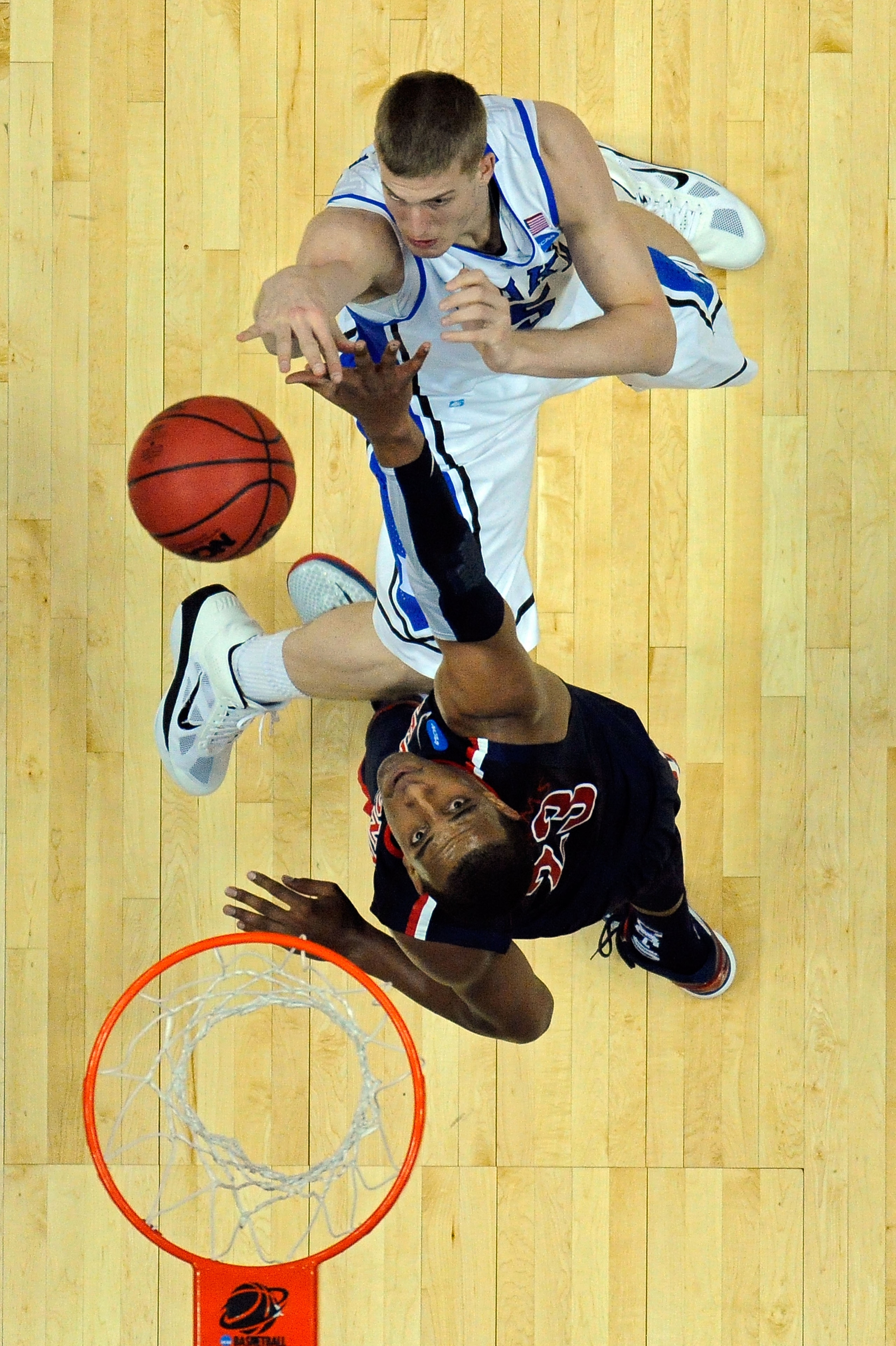 ANAHEIM, CA - MARCH 24:  Mason Plumlee #5 of the Duke Blue Devils shoots over Derrick Williams #23 of the Arizona Wildcats during the west regional semifinal of the 2011 NCAA men's basketball tournament at the Honda Center on March 24, 2011 in Anaheim, Ca