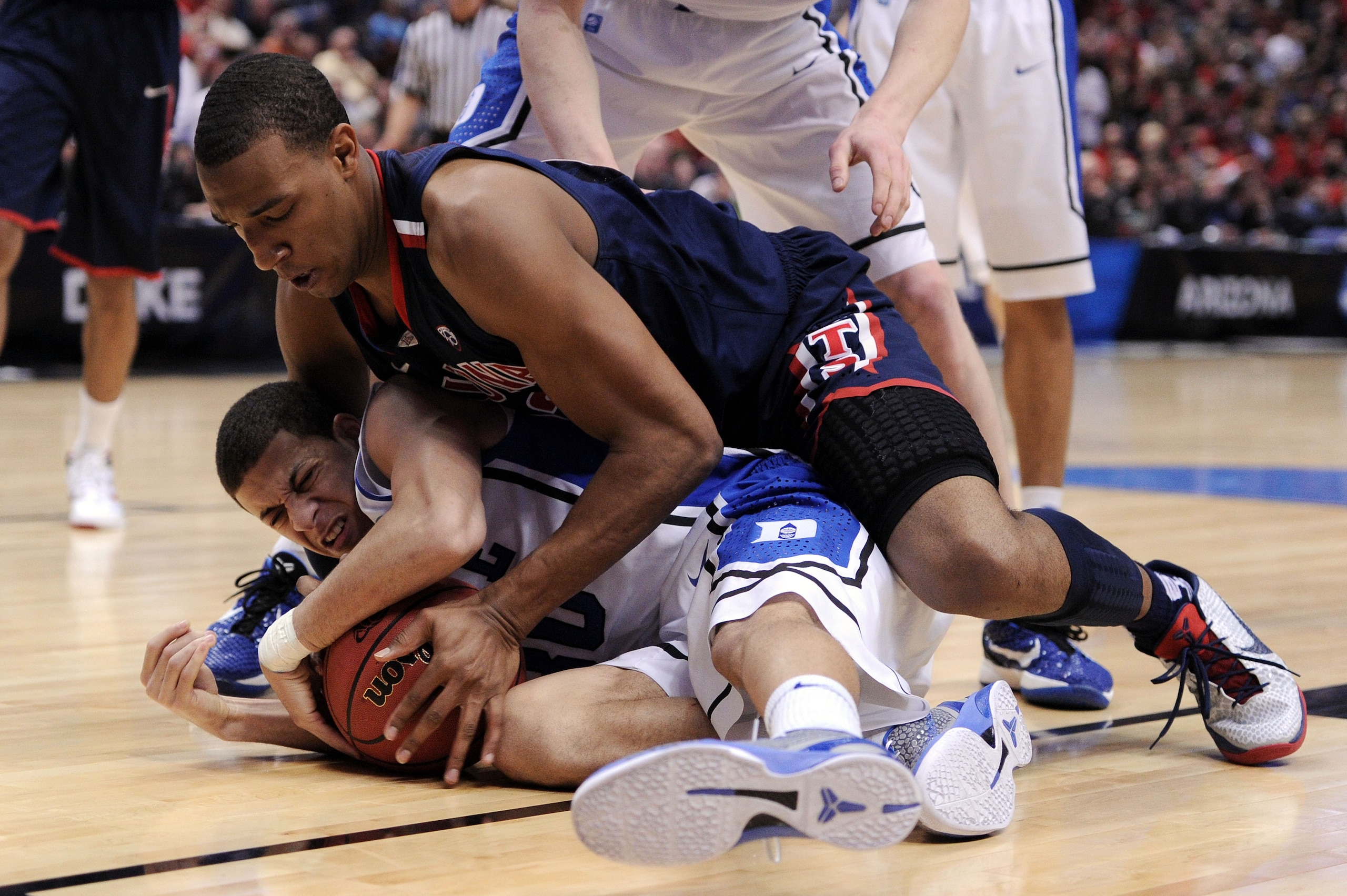 ANAHEIM, CA - MARCH 24:  Derrick Williams #23 of the Arizona Wildcats fights for the ball against Seth Curry #30 of the Duke Blue Devils during the west regional semifinal of the 2011 NCAA men's basketball tournament at the Honda Center on March 24, 2011