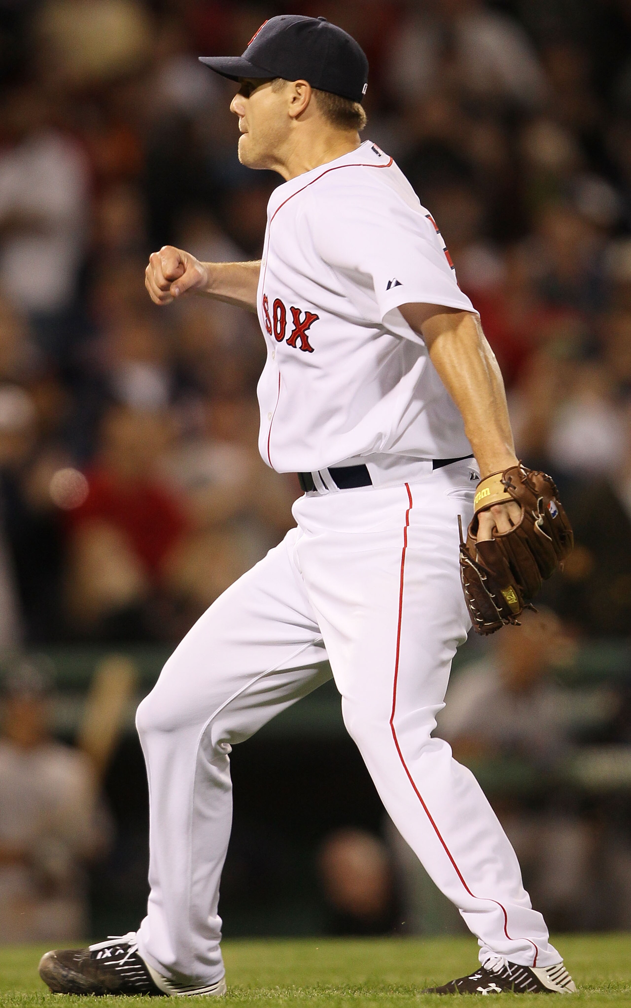 BOSTON - APRIL 04:  Jonathan Papelbon #58 of the Boston Red Sox celebrates the last out and the win over the New York Yankees on April 4, 2010 during Opening Night at Fenway Park in Boston, Massachusetts. The Red Sox defeated the Yankees 9-7.  (Photo by E
