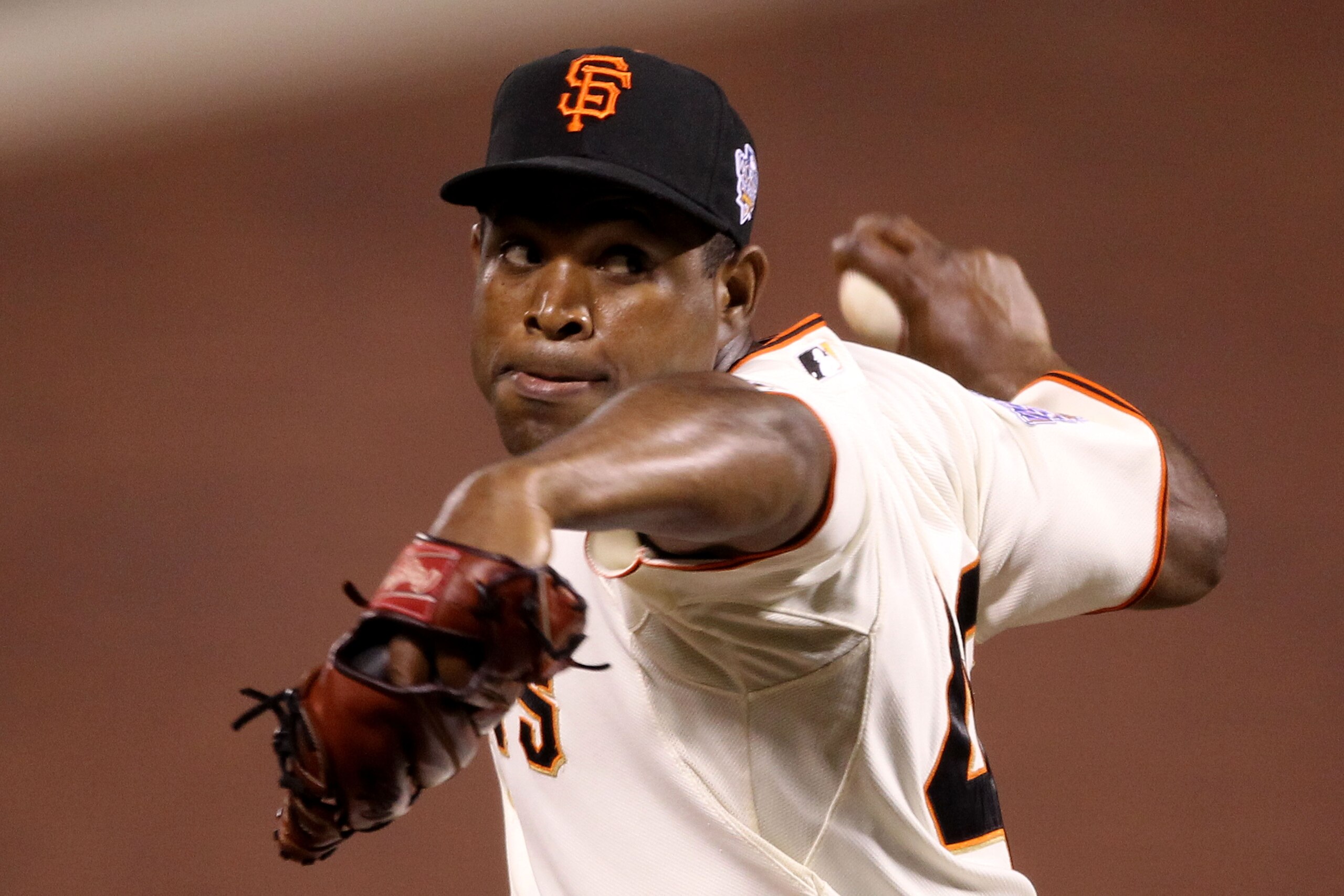 SAN FRANCISCO - OCTOBER 27:  Santiago Casilla #46 of the San Francisco Giants pitches against the Texas Rangers in Game One of the 2010 MLB World Series at AT&T Park on October 27, 2010 in San Francisco, California.  (Photo by Ezra Shaw/Getty Images)