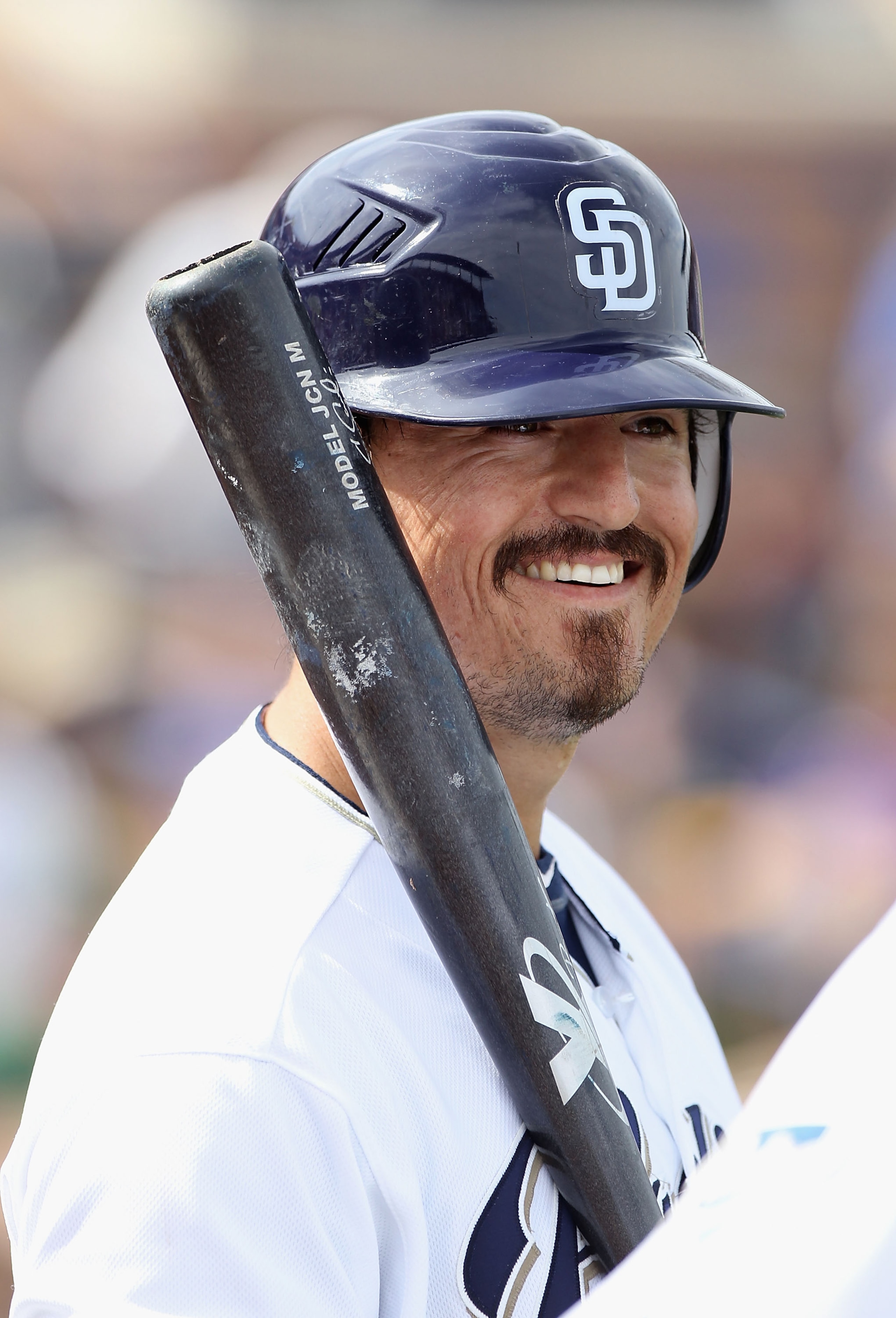 PEORIA, AZ - MARCH 06:  Jorge Cantu #32 of the San Diego Padres warms up on deck during the spring training game against the Oakland Athletics at Peoria Stadium on March 6, 2011 in Peoria, Arizona.  (Photo by Christian Petersen/Getty Images)