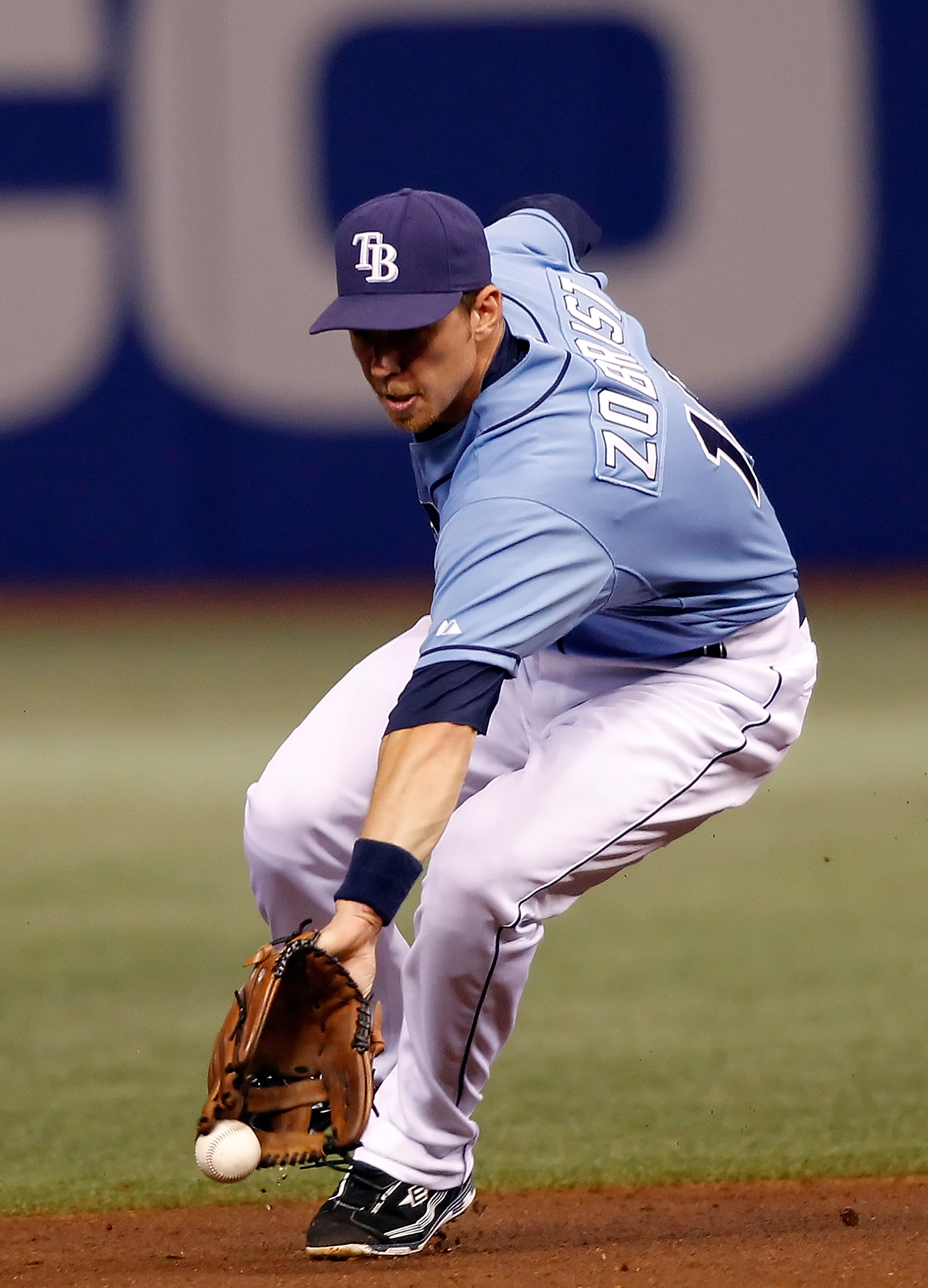 ST. PETERSBURG - AUGUST 29:  Infielder Ben Zobrist #18 of the Tampa Bay Rays cannot come up with this ground ball against the Boston Red Sox during the game at Tropicana Field on August 29, 2010 in St. Petersburg, Florida.  (Photo by J. Meric/Getty Images
