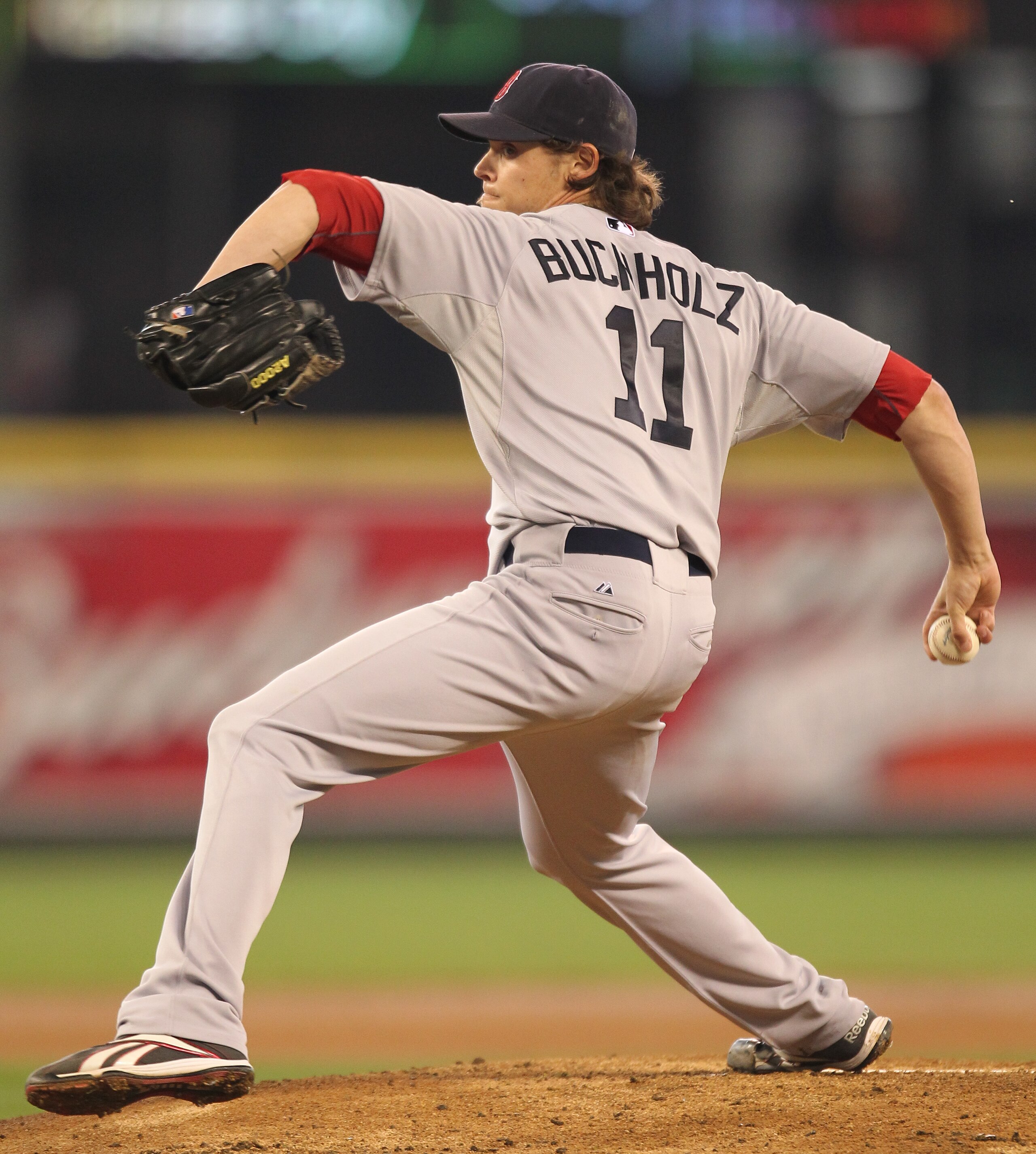 SEATTLE - SEPTEMBER 15:  Starting pitcher Clay Buchholz #11 of the Boston Red Sox pitches against the Seattle Mariners at Safeco Field on September 15, 2010 in Seattle, Washington. (Photo by Otto Greule Jr/Getty Images)