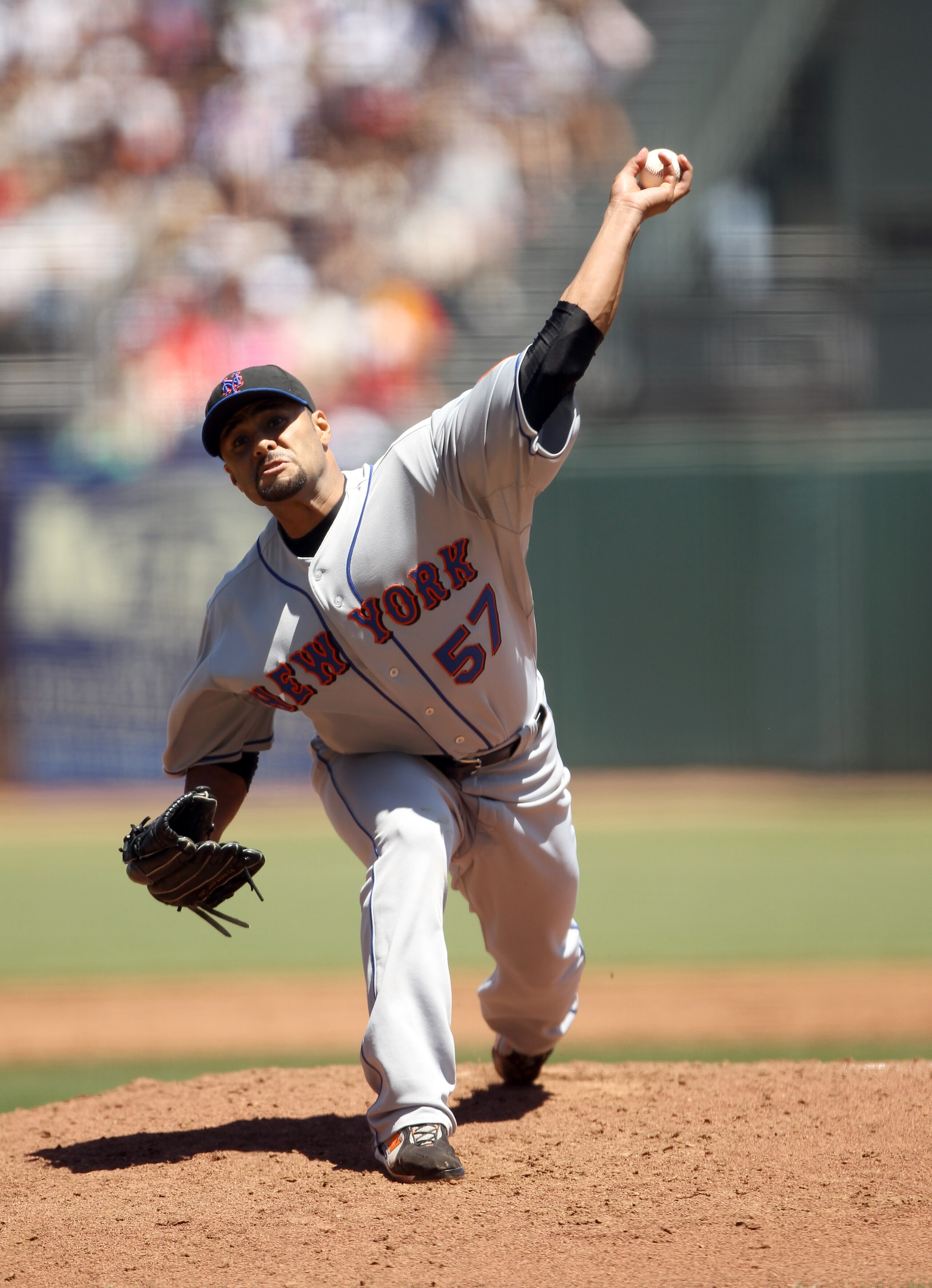 SAN FRANCISCO - JULY 18:  Johan Santana #57 of the New York Mets pitches against the San Francisco Giants at AT&T Park on July 18, 2010 in San Francisco, California.  (Photo by Ezra Shaw/Getty Images)